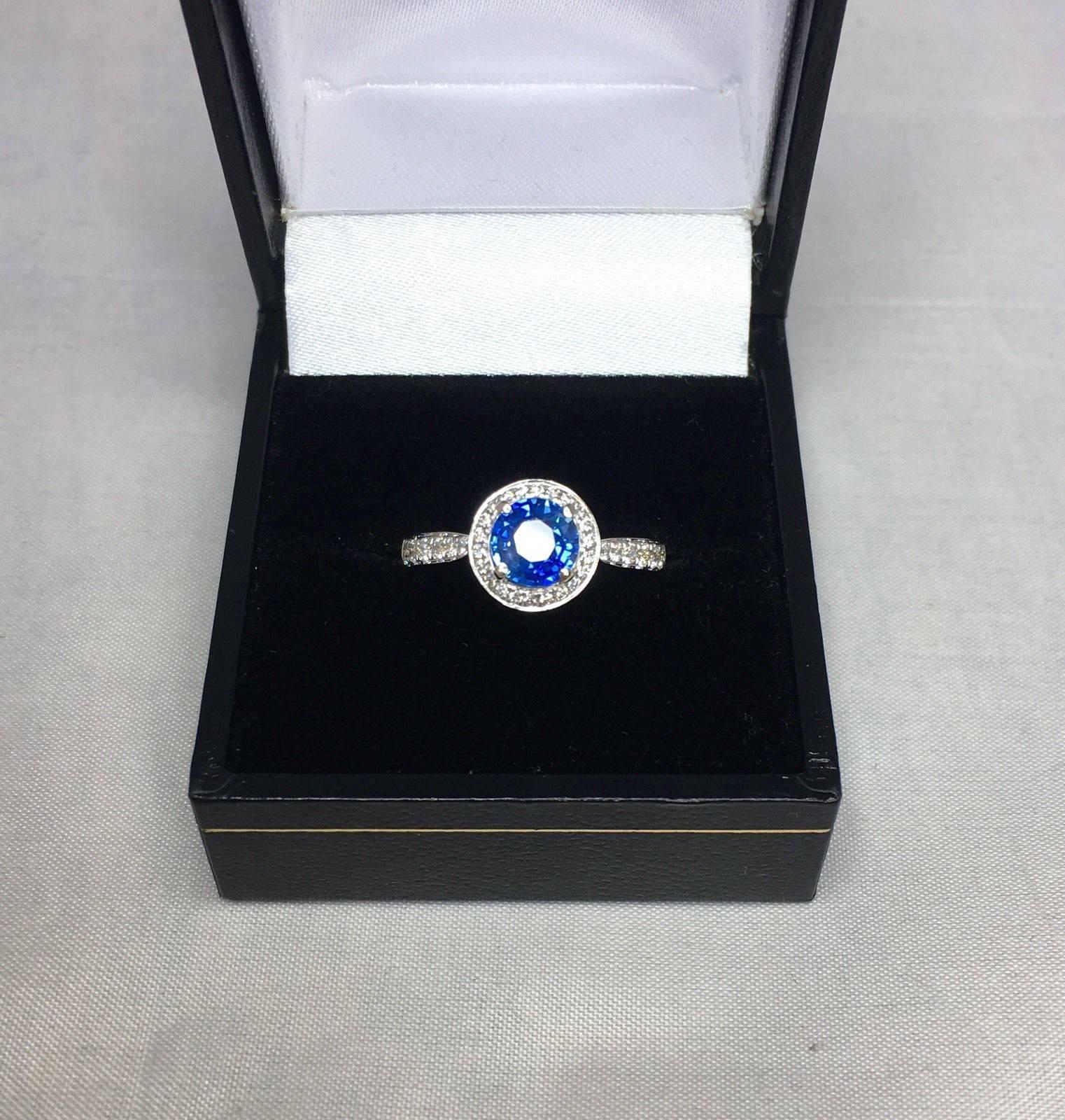 1.30 Carat Ceylon Blue Sapphire and Diamond Halo Ring 18 Karat White Gold 1