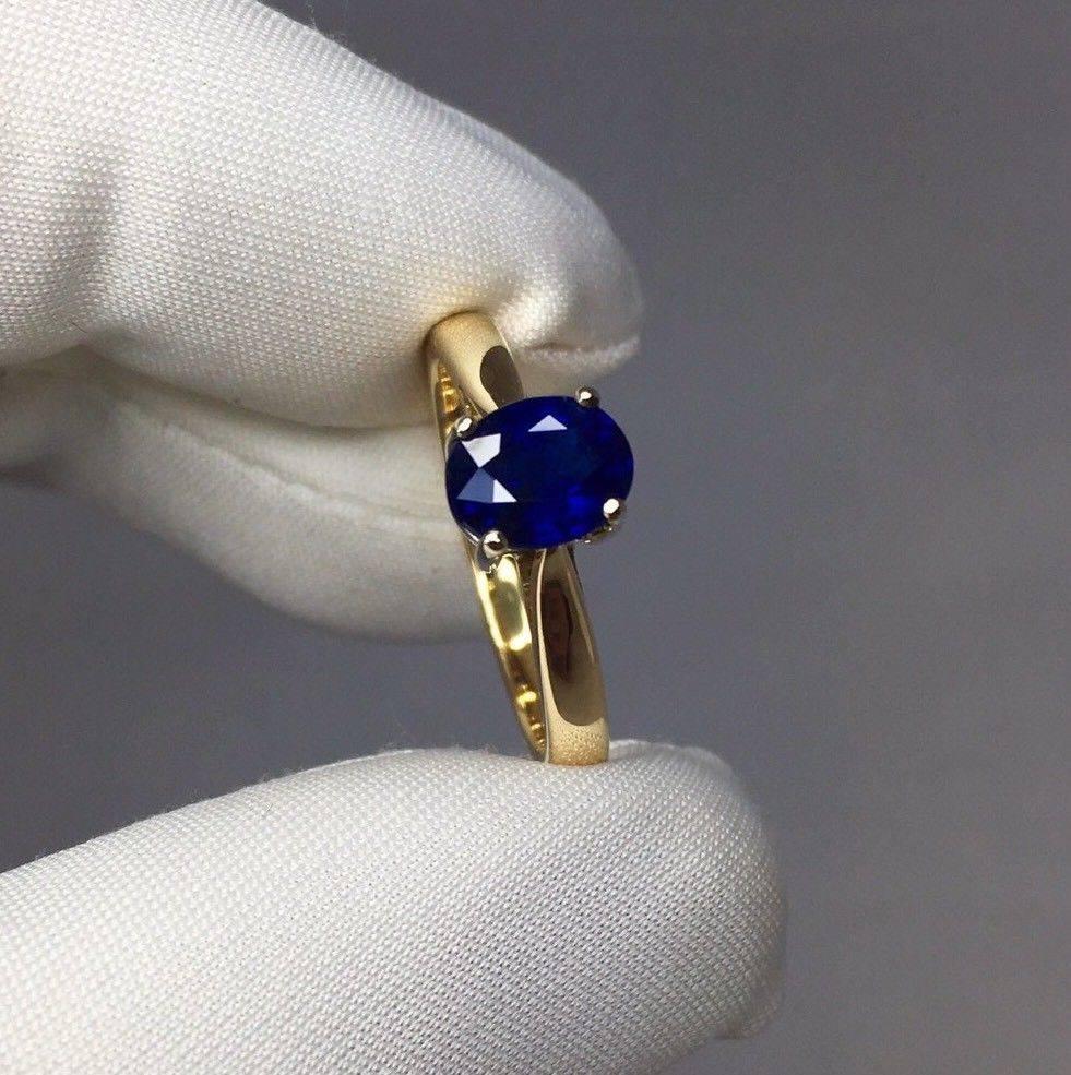 Fine natural deep blue sapphire set in a beautiful 18k gold setting.

1.31 carat stone with stunning vivid blue colour and very good clarity. Totally untreated and unheated, comes with full GIA report to confirm stone is natural and untreated.
