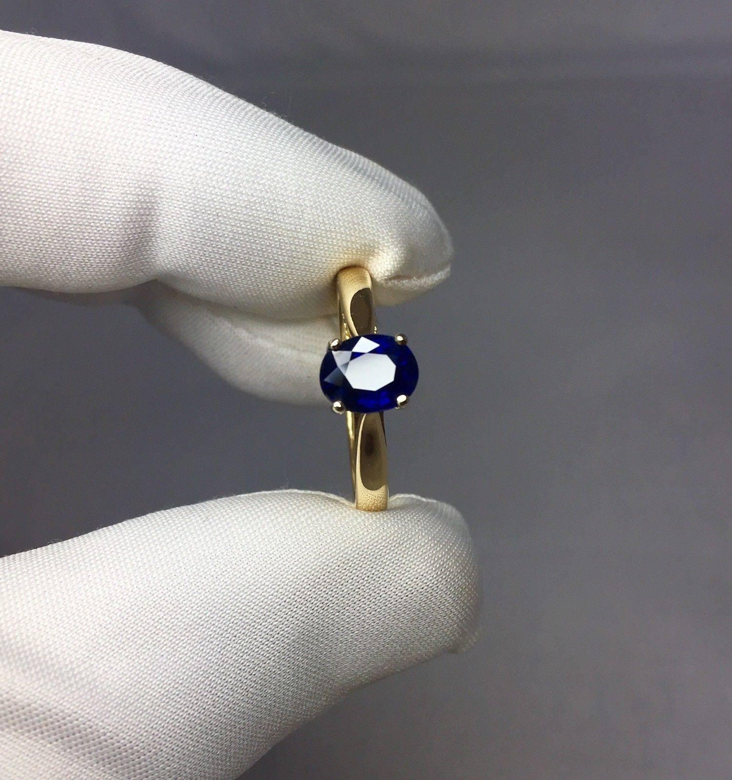 GIA Certified 1.31 Carat Untreated Blue Sapphire Solitaire Ring, 18 Karat Gold 2