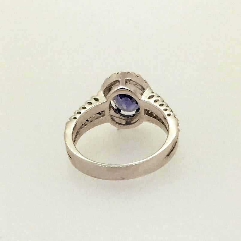 Oval Cut 3.24 Carat Blue Sapphire Diamond Ring