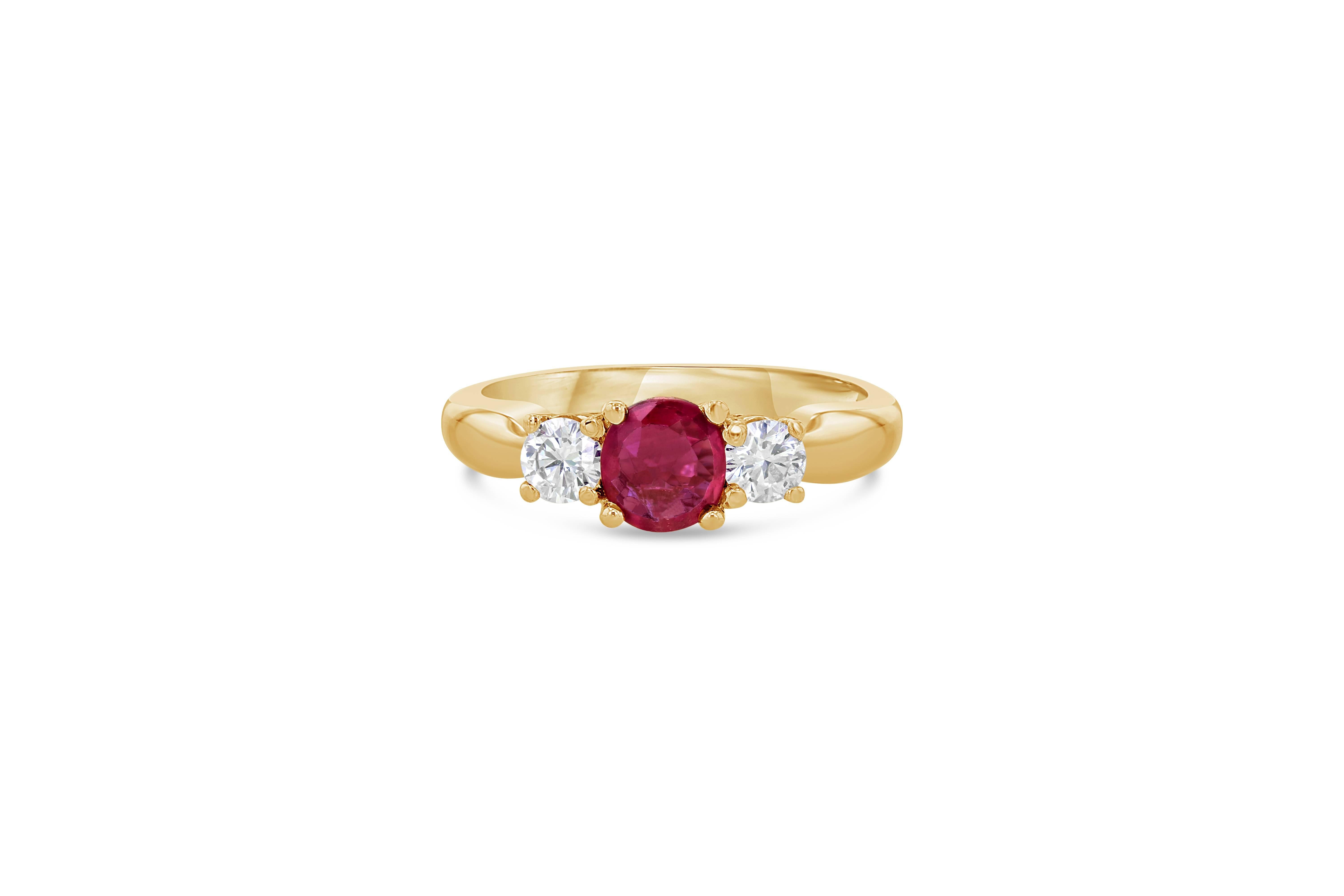 This classic 3 Stone Ring represents the past, present and future of a relationship with a Ruby as its center stone. The origin of the Ruby is Burmese and is 0.68 Carats; the 2 Round Cut Diamonds weigh 0.40 Carats with a clarity and color of SI-F.