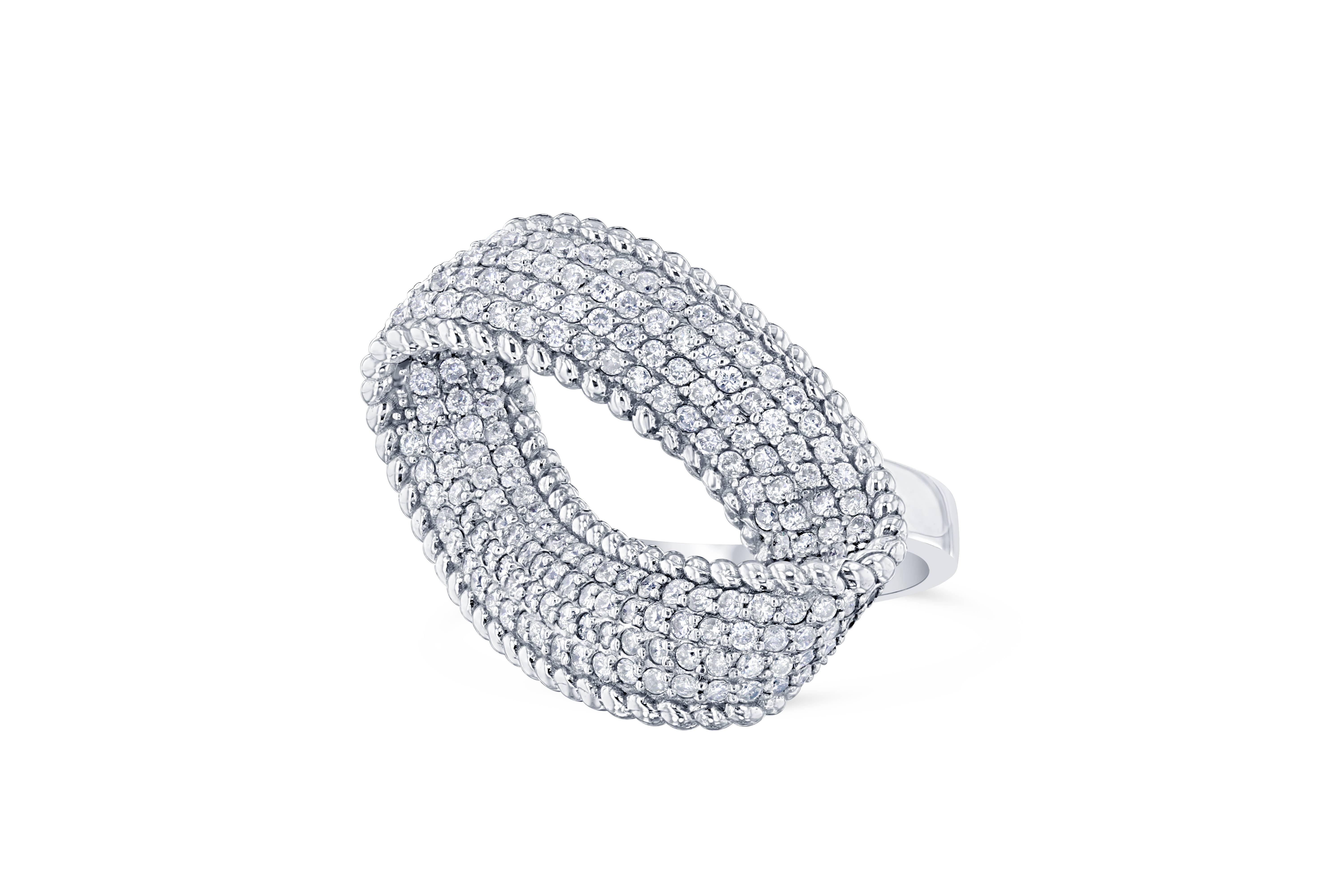 Inspired from the infinity loop design, this ring is a must-have!  There are 186 Round Cut Diamonds that weigh 1.16 carats. This ring is casted in 14K White Gold and weighs approximately 8.3 grams.  The ring is a size 6 and can be re-sized at no