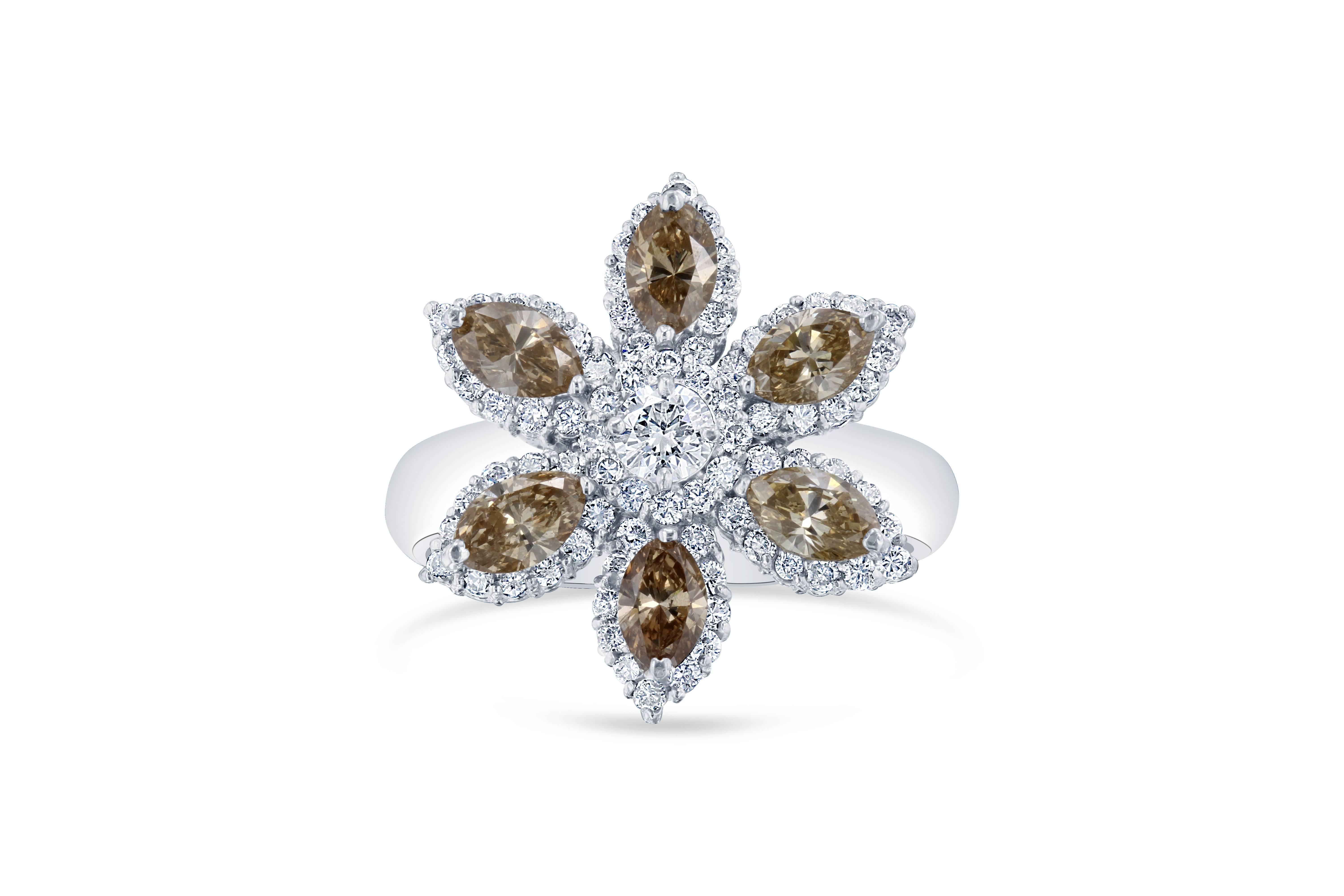 This is nothing but a gorgeous ring set with brown and white diamonds. The 6 brown diamonds that adorn the petals are Marquise Cut Natural Diamonds with a Natural Color and weigh 1.28 Carats. The 79 Round Cut Diamonds that surround the remainder of