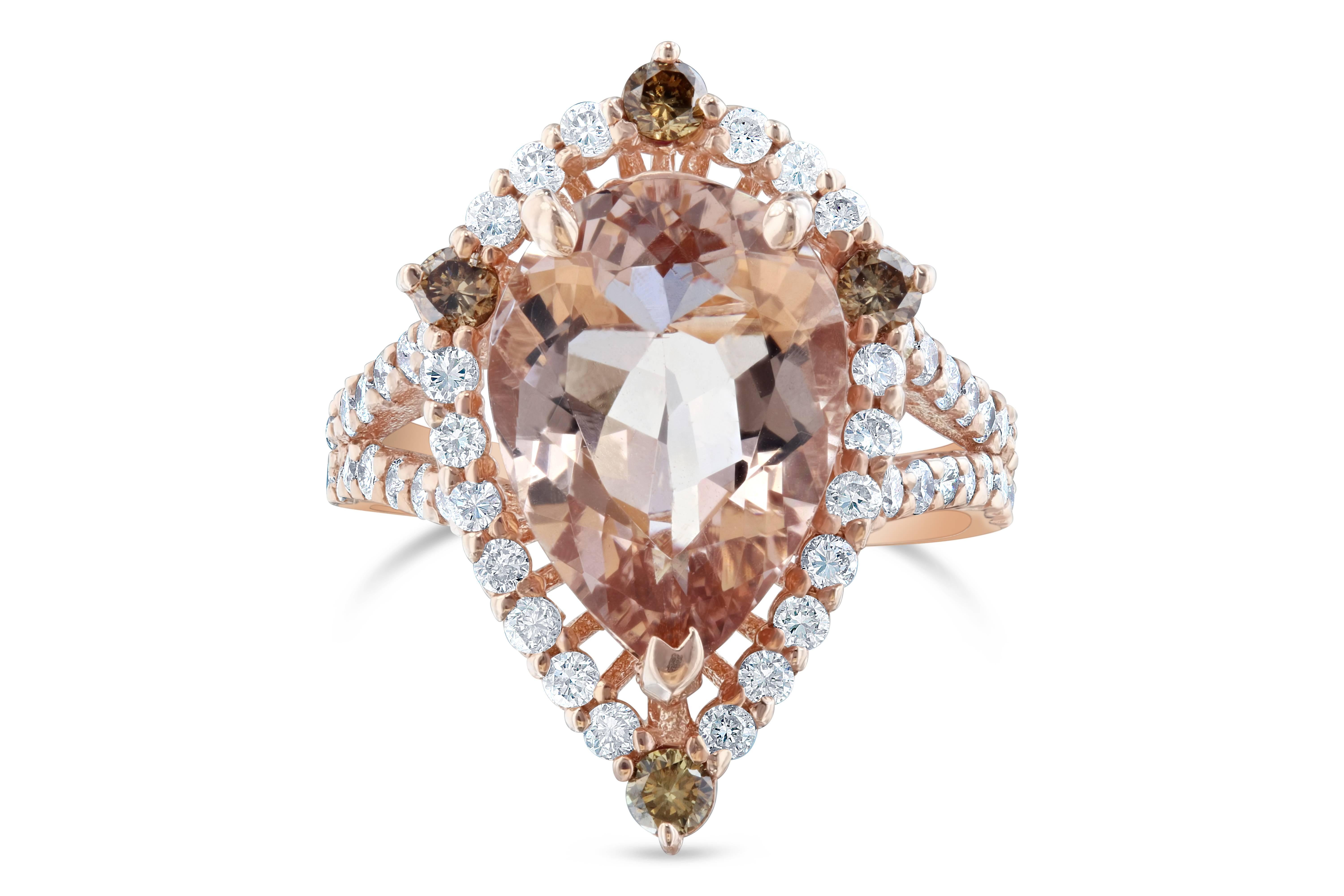 A great alternative to the cliche Diamond Engagement ring! This ring has a 3.83 carat Pear Cut Morganite in the center of the ring. This ring is surrounded by 44 Round Brilliant Cut Diamonds that weigh a total of 0.62 carat and is accented by 4