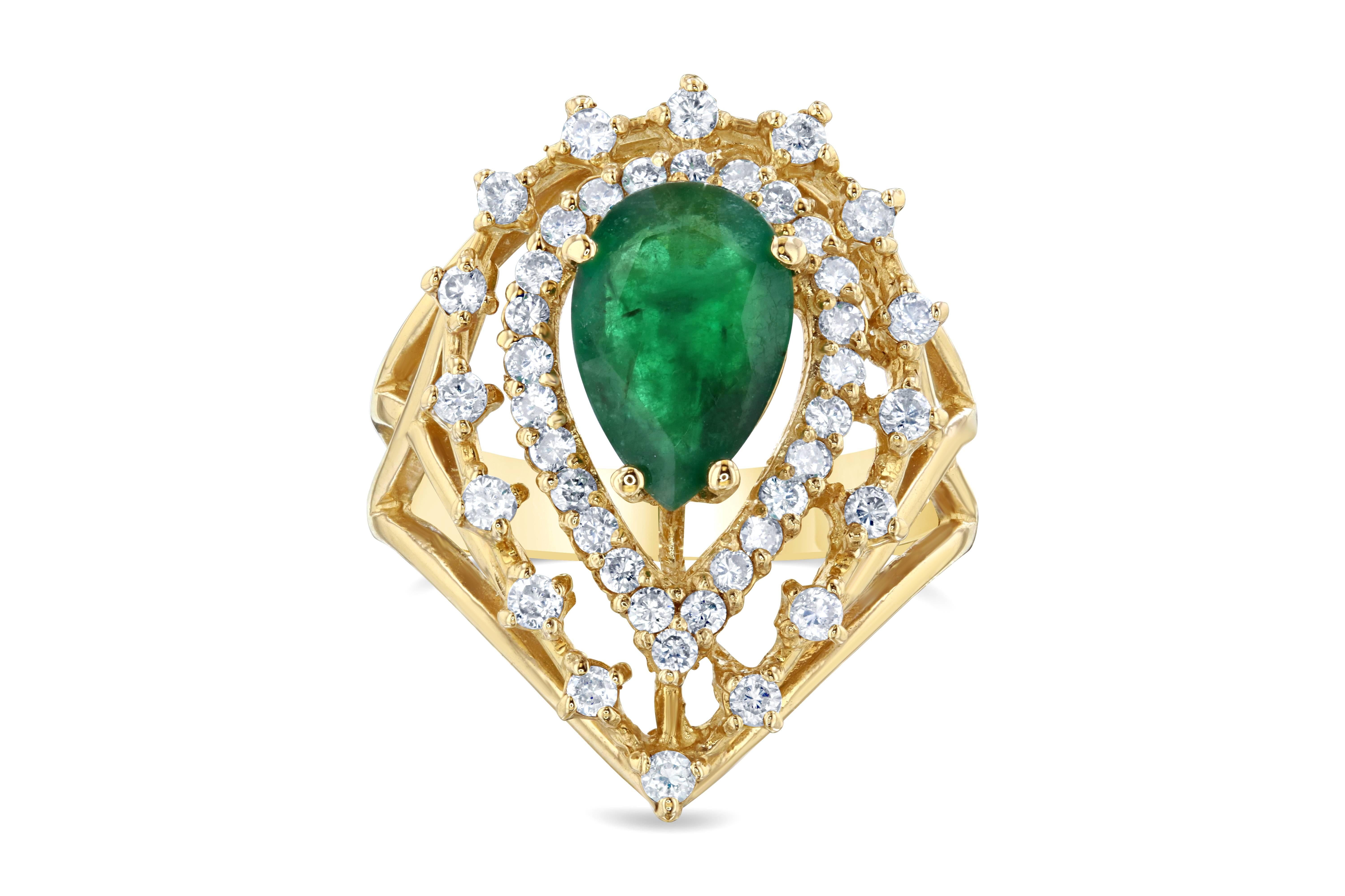A Simply Stunning work of Art! 
This Victorian-Inspired ring has a center pear cut Emerald that weighs 1.63 Carats with 42 Round Cut Diamonds beautifully placed around the setting weighing 0.63 Carats. The Total Carat Weight of the ring is 2.26