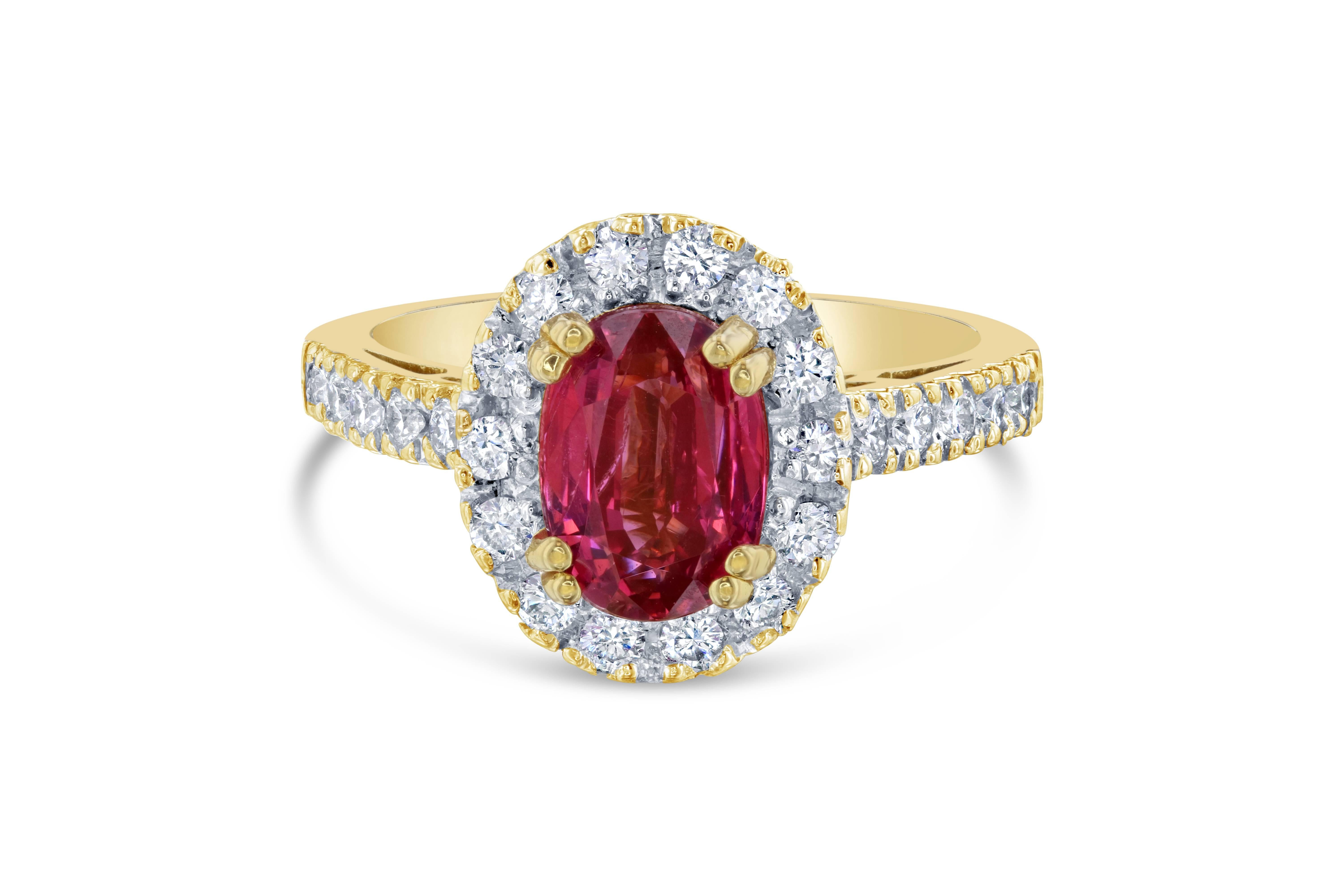 Calling all Spinel Lovers! A Beautiful Halo Natural Spinel and Diamond Ring that can be worn as a traditional cocktail ring, engagement ring or simply an everyday ring! 
The Spinel is natural and weighs 2.37 Carats and is surrounded by 25 Round Cut