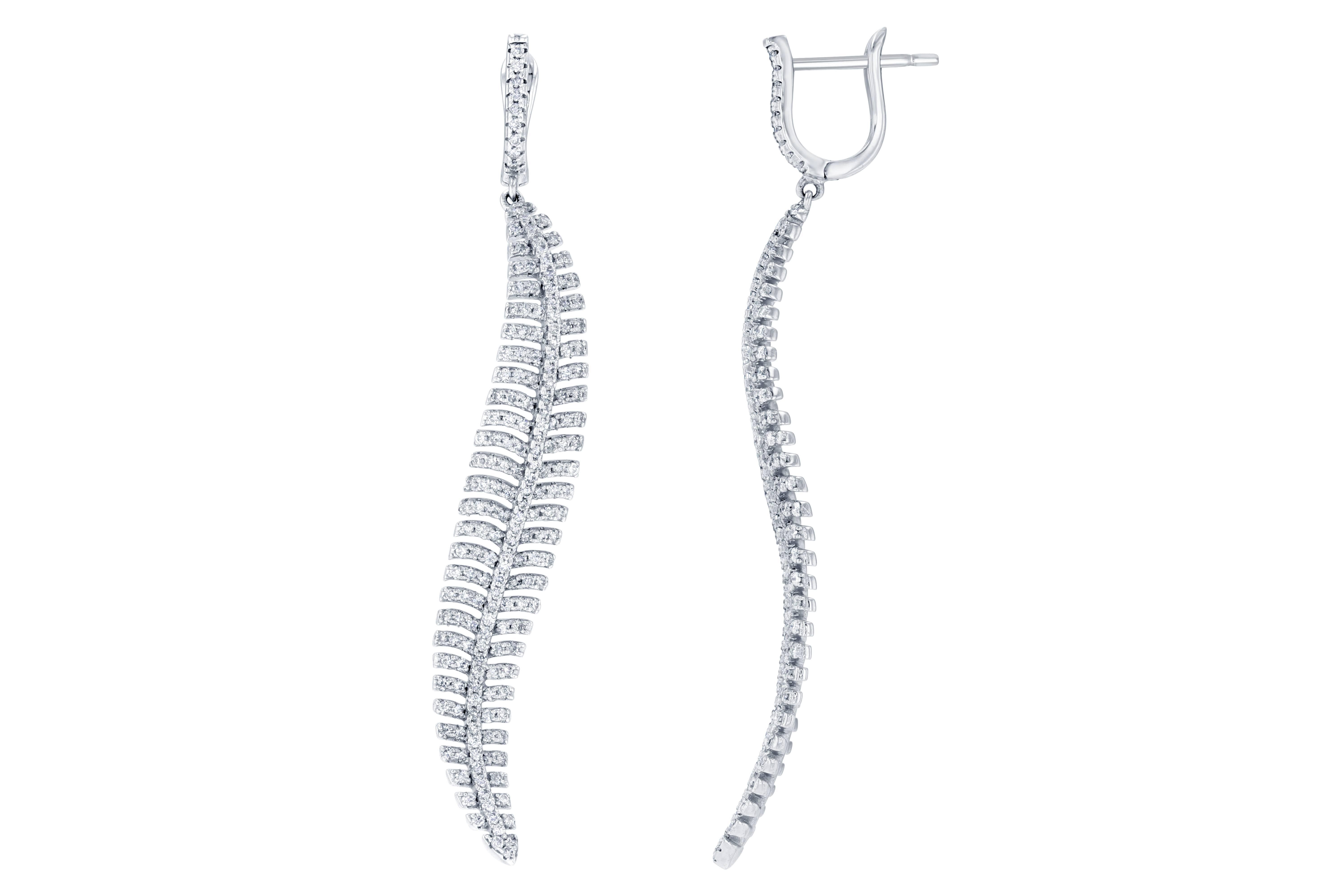 These delicate, yet intricate feather design earrings are sure to compliment everyone's wardrobe!  The earrings are approximately 2.75 inches long.  There are 382 Round Cut Diamonds that weigh 2.33 carats (Clarity: VS2/Color: F).  Made in 14K White
