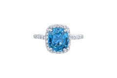 Bague de fiançailles en or blanc 18 carats avec zircon bleu de 4,27 carats et diamants