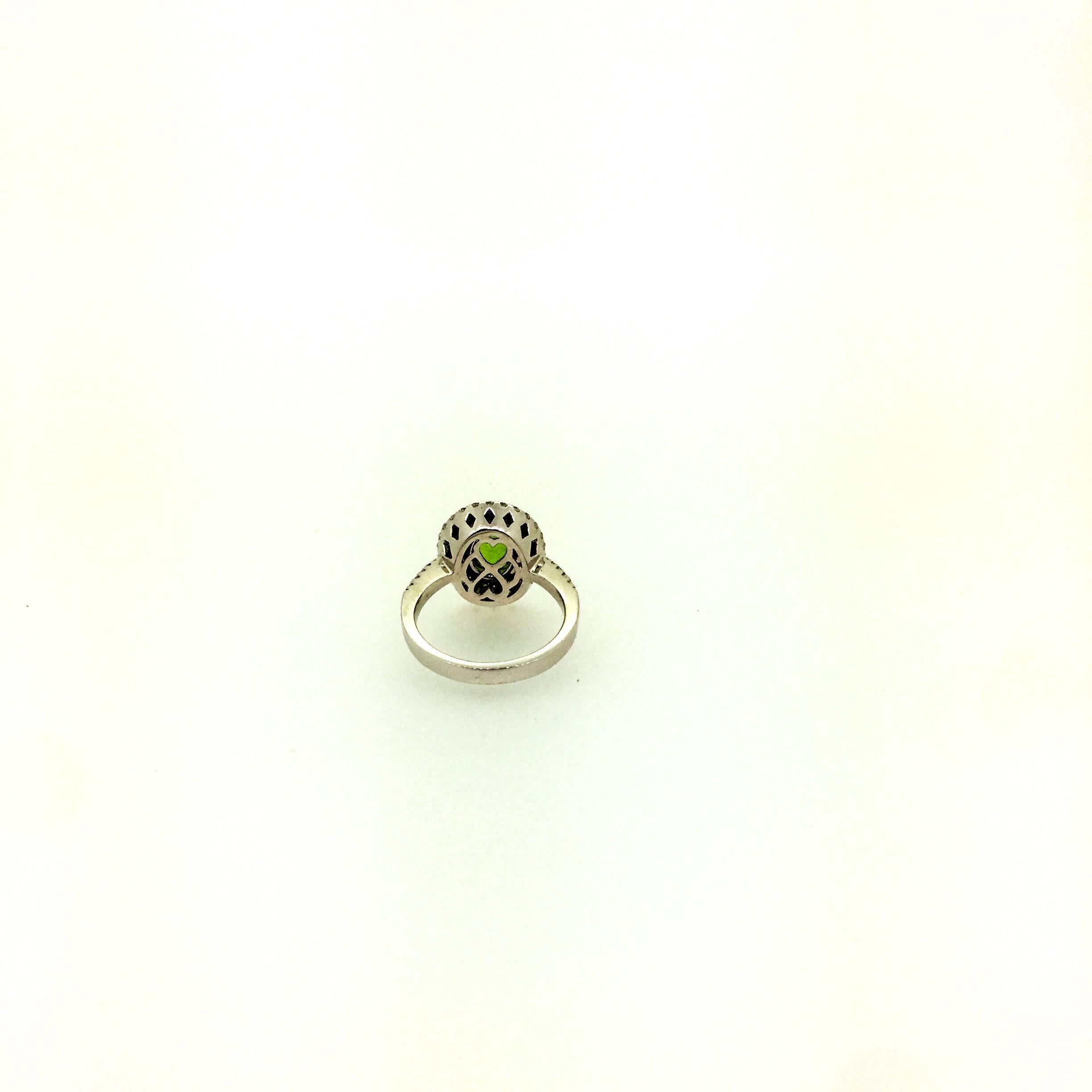 1.90 Carat Oval Cut Tsavorite and Diamond 14 Karat White Gold Halo Ring In New Condition In Los Angeles, CA