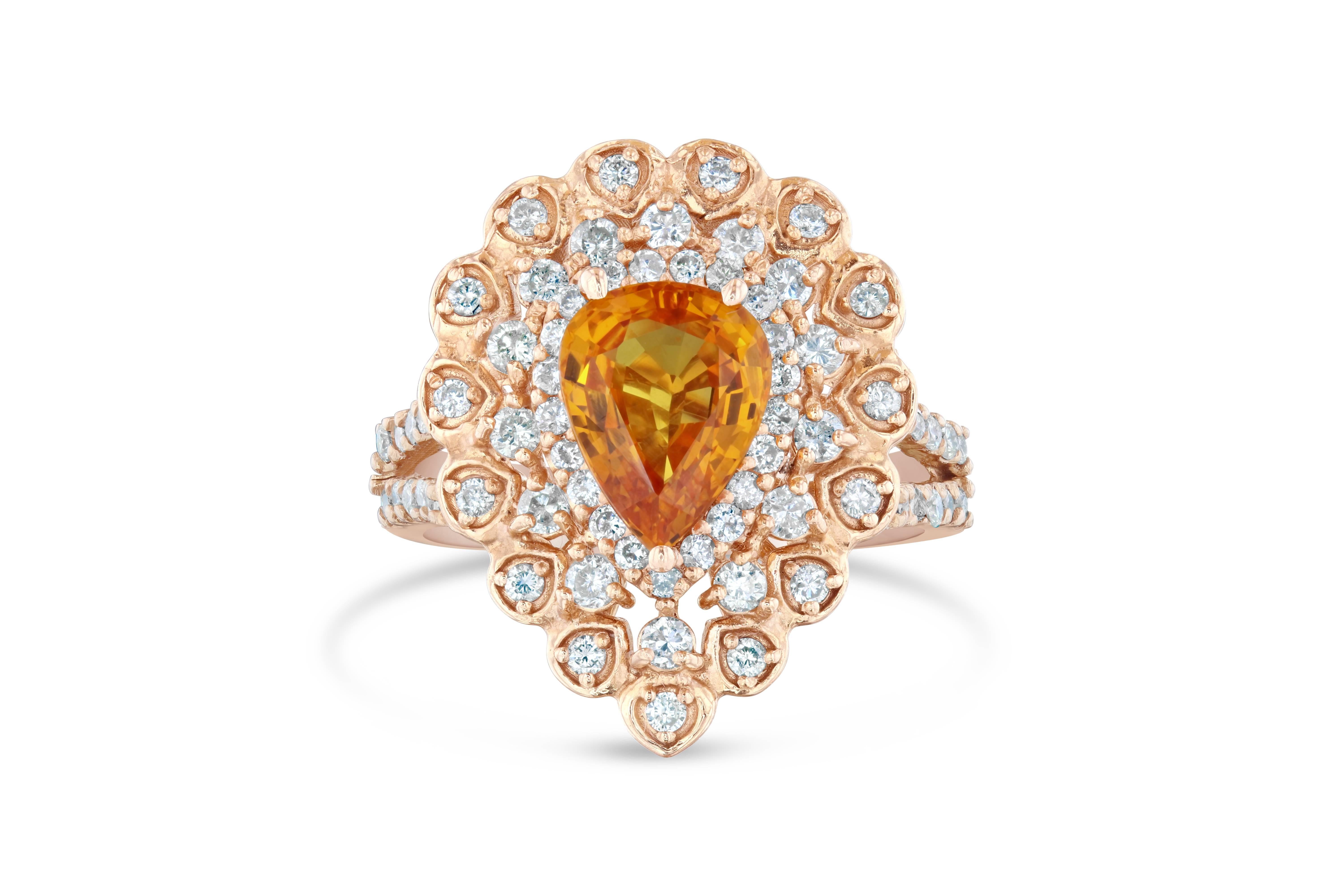 Mirror Mirror On The Wall..What is the most Beautiful Ring of all??? 
An astounding Orange Sapphire and Diamond Ring with a Victorian style setting in Rose Gold!
The Pear Cut Orange Sapphire is 2.14 Carats surrounded by 74 Round Cut Diamonds