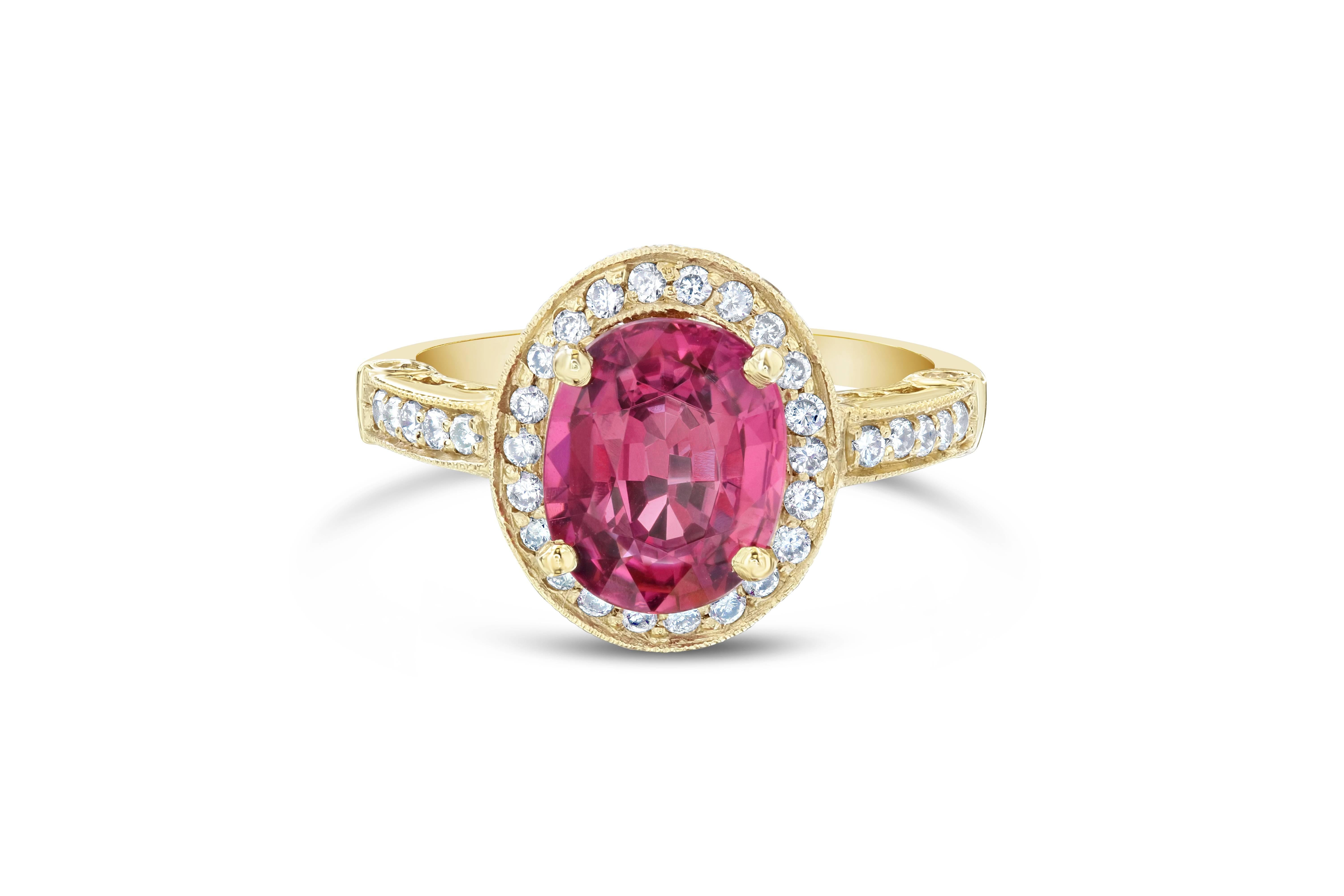Unique, beautiful and bright Tourmaline and Diamond Ring with an antique style setting. Wear it as a Cocktail, Fashion or as an Everyday Ring! 

The Oval Cut Tourmaline is 2.46 Carats surrounded by beautifully set 73 Round Cut Diamonds weighing 0.70