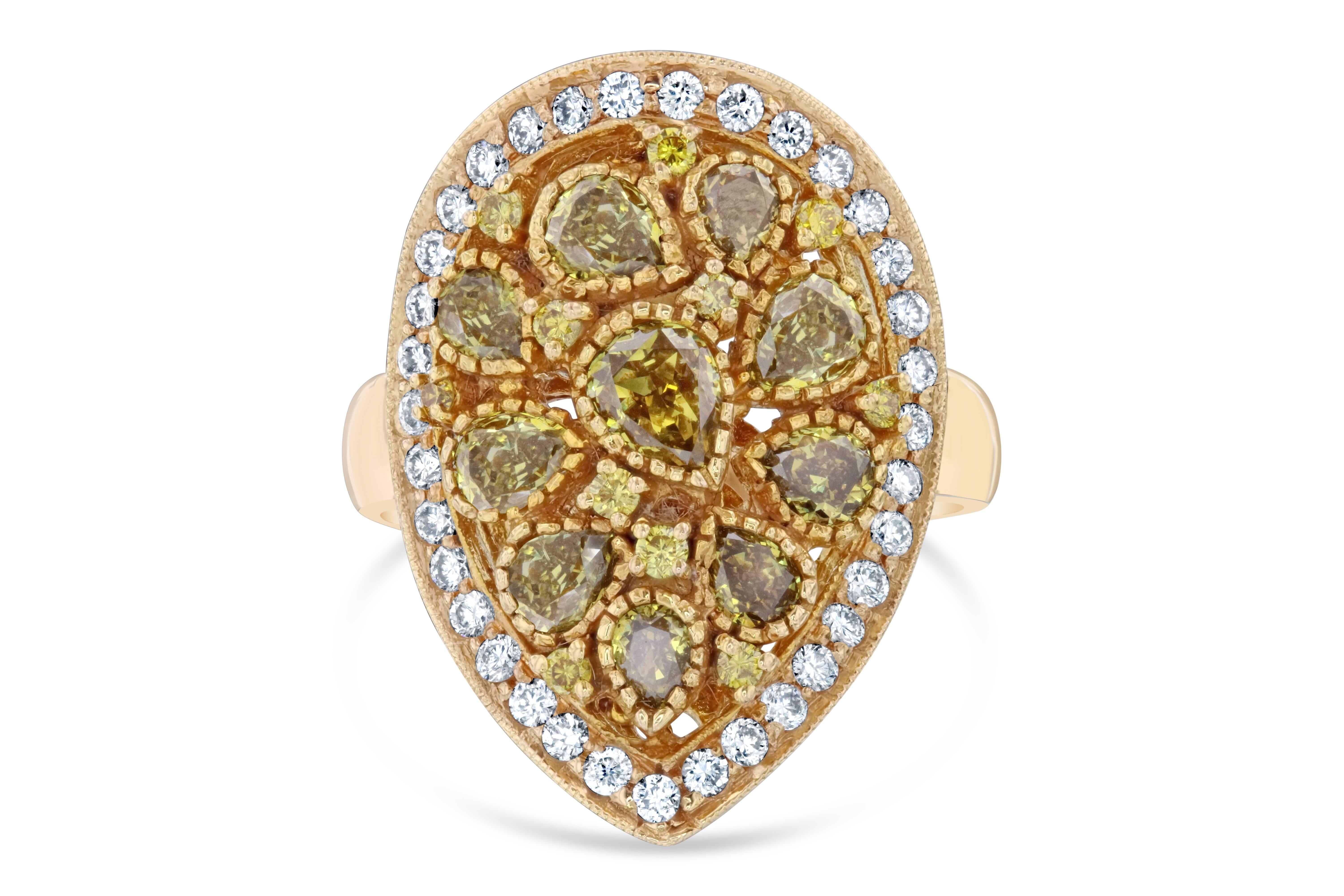 Another gorgeous version of our bubble gum cocktail ring in a Pear Cut setting!  There are 10 Pear Cut Fancy Colored Diamonds that weigh 1.91 carats floating around the center of the ring.  The colors and sizes of the diamonds vary from dark brown