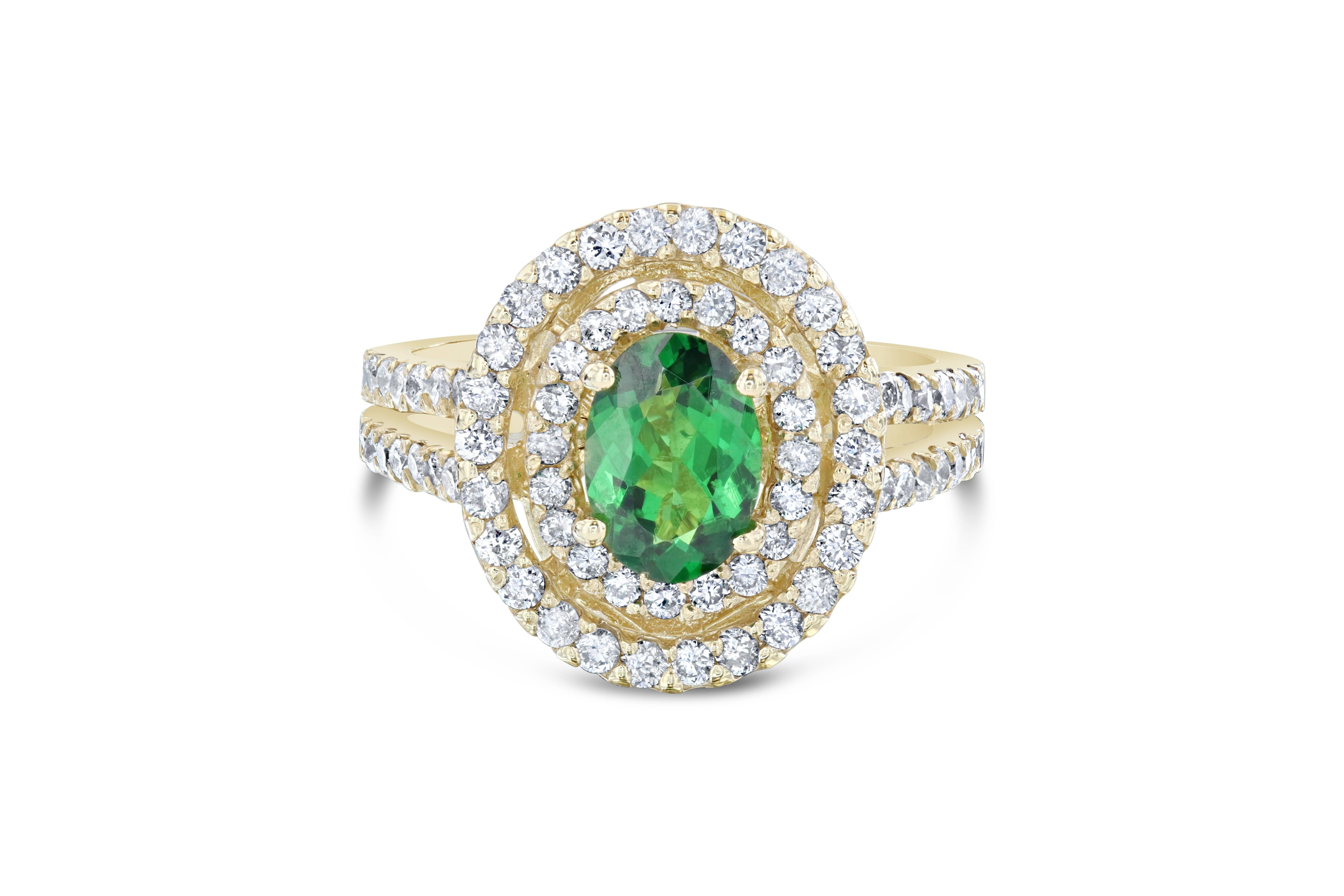 Elegant and unique setting that can compliment anyone!  This ring can easily transform into an engagement ring for the woman who wants to dip into something new and fresh.  This ring has a Oval cut Tsavorite which weighs 1.13 carats and is