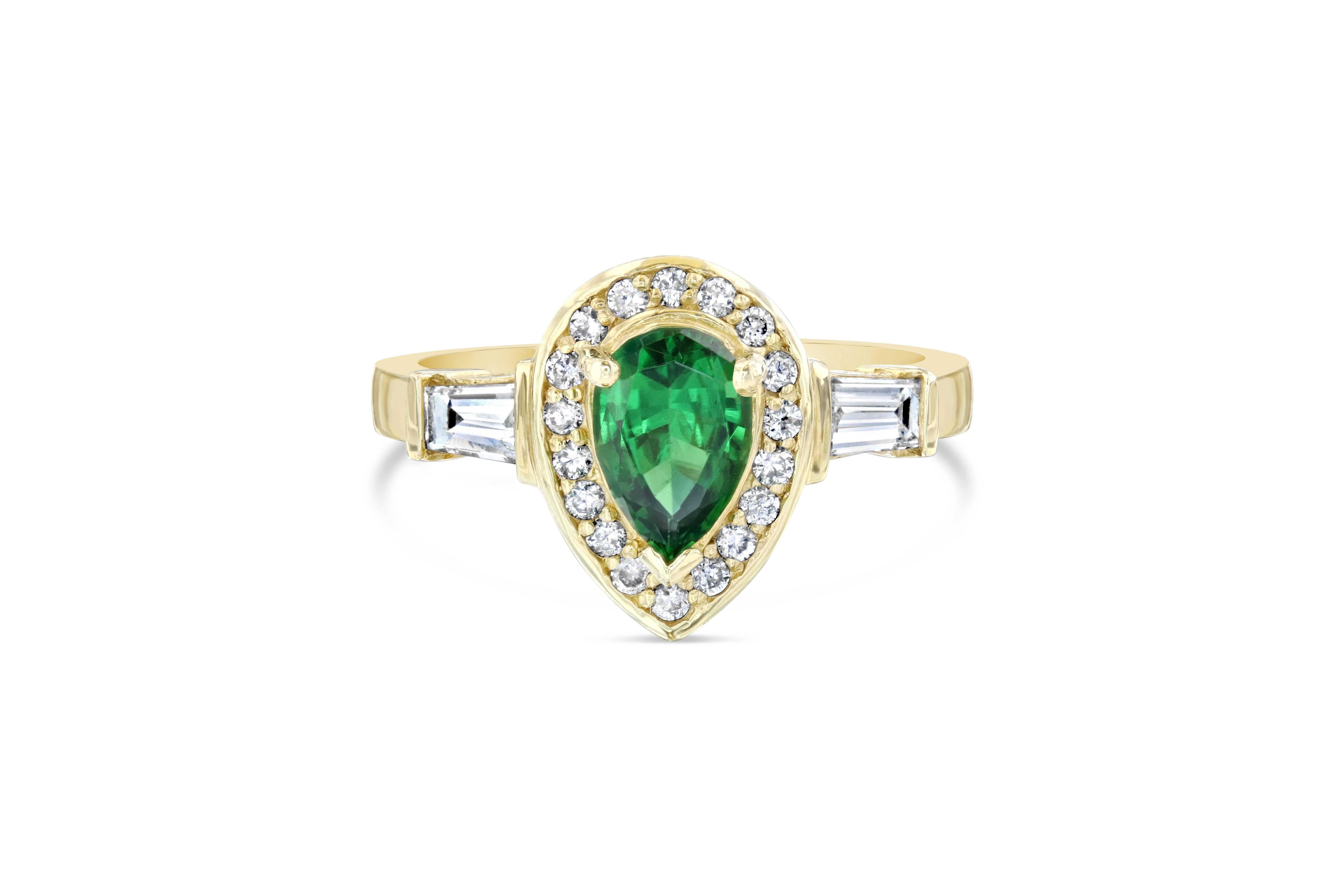This beautiful ring can easily be a cocktail ring or an engagement ring, either way it is very eye catching! The ring has a Pear Cut Tsavorite which weighs 0.90 carats and is surrounded by a sing halo of 17 Round Cut Diamonds that weighs 0.19 carats