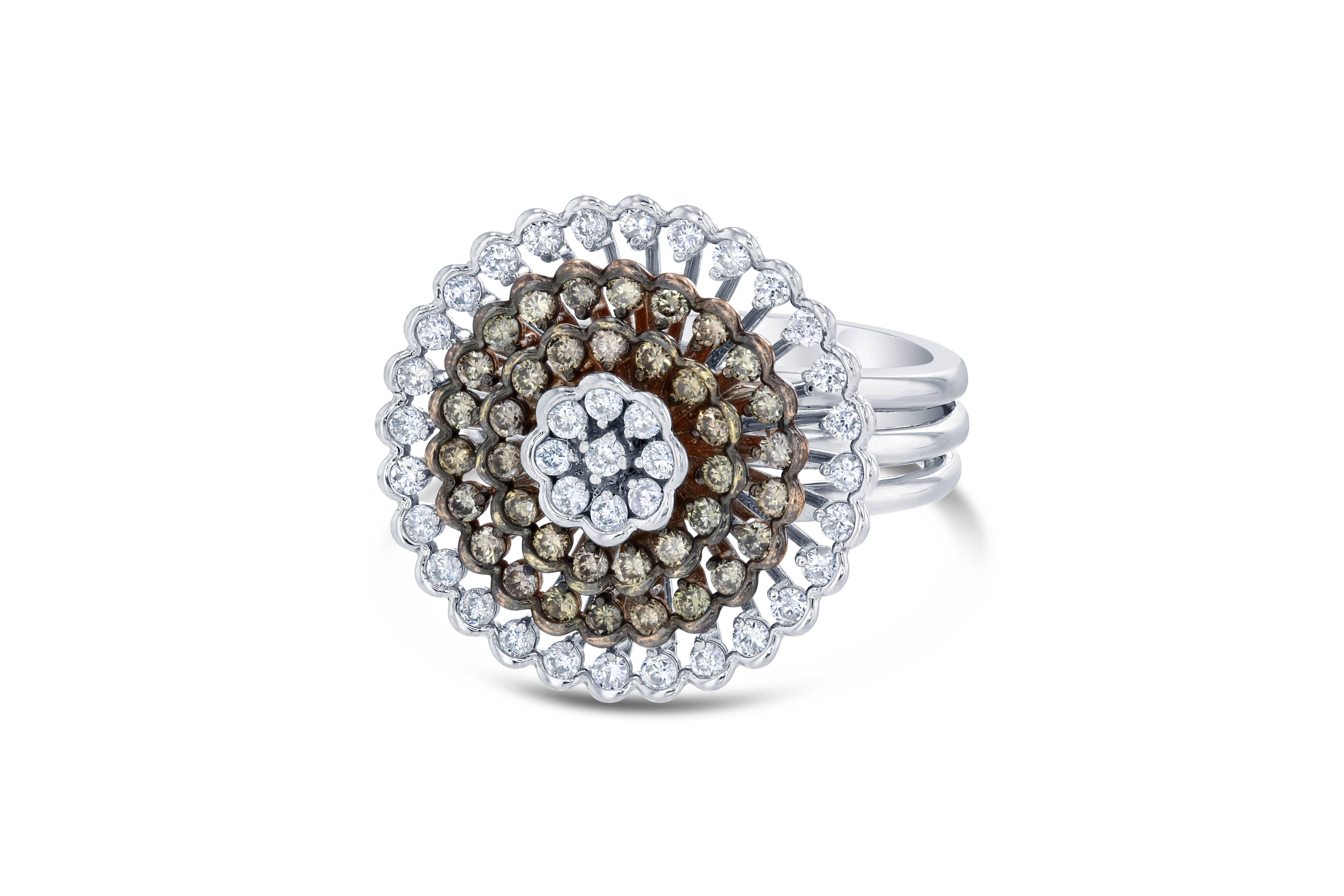 This is a unique looking fancy diamond dome/cluster ring.

There are 37 natural and fancy colored brown round cut diamonds that weigh 0.61 carats and there are 37 white round cut diamonds that weigh 0.61 carats. 

The dome setting is crafted in 14K