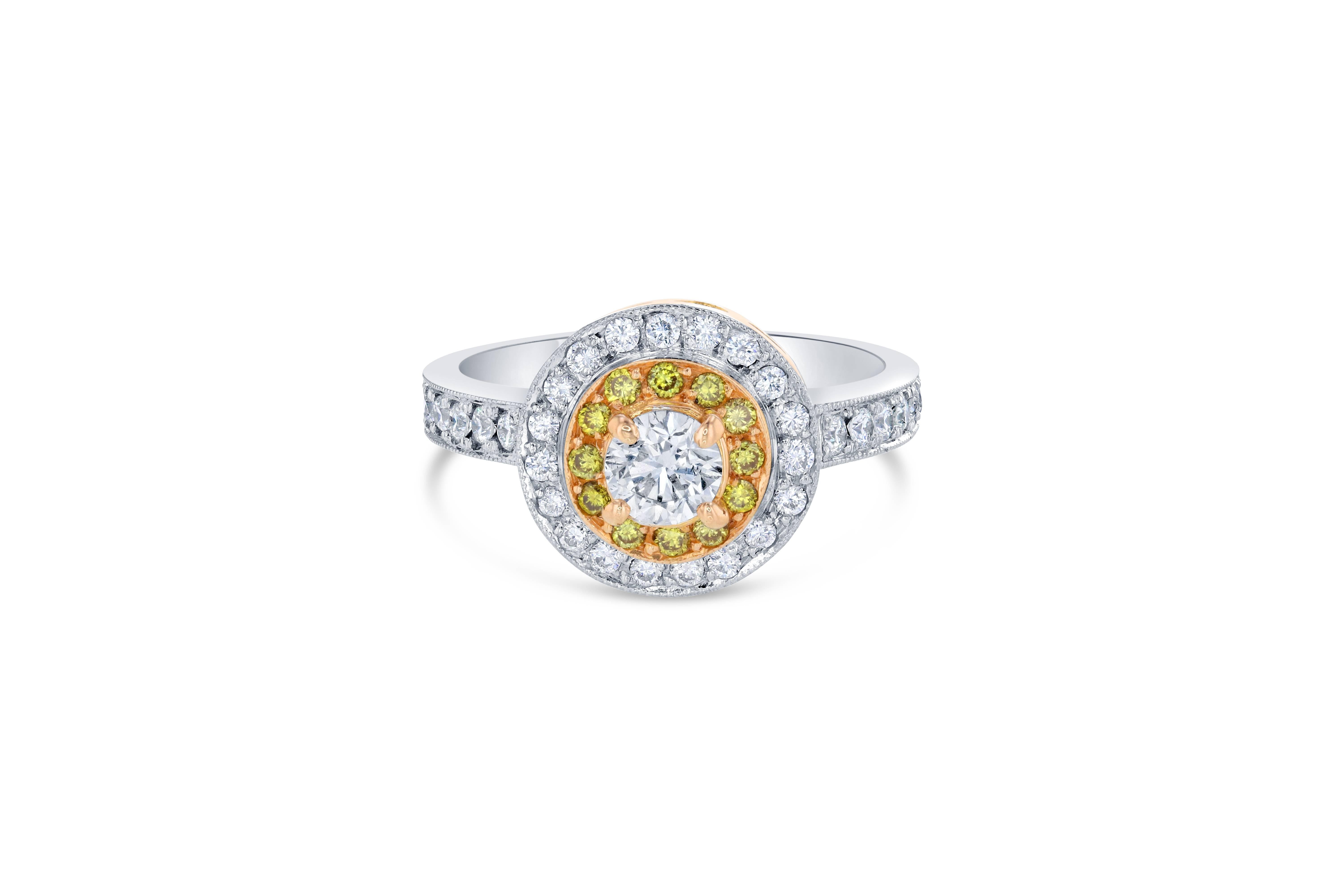 Stunning Round Brilliant Cut Diamond Ring! 

The center Round Cut Diamond is 0.40 Carats with a clarity and color of SI-F. It is surrounded first by a halo of natural 12 Yellow Round Cut Diamonds that weigh 0.15 Carats and a second halo of 33 Round