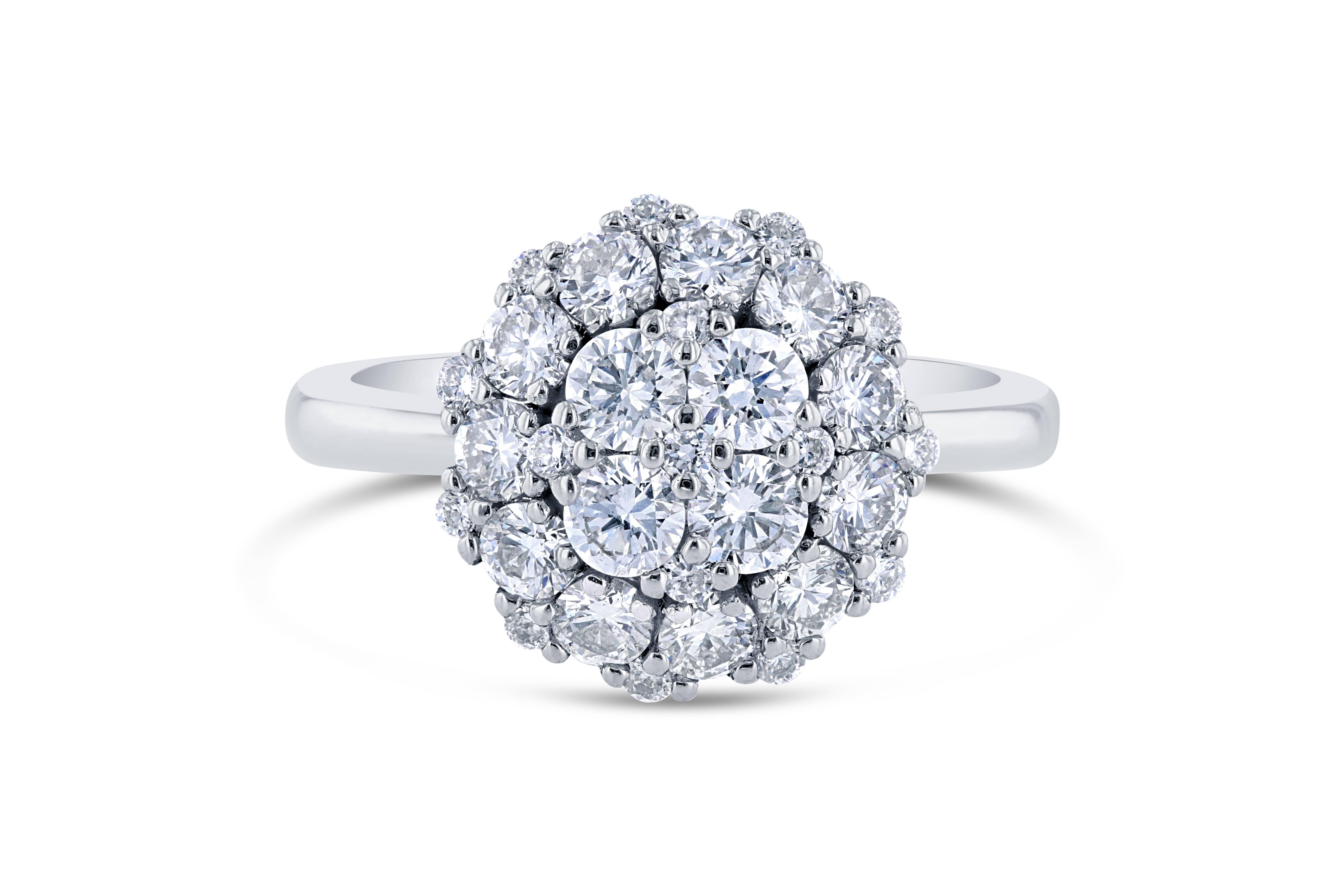 A gorgeous cocktail ring that will fulfill all your desires! A real stunner! Do not miss this unique diamond ring!

It has 31 Round Cut Diamonds that weigh a total of 1.46 Carats. The clarity and color of the diamonds are VS-F. 

It is beautifully