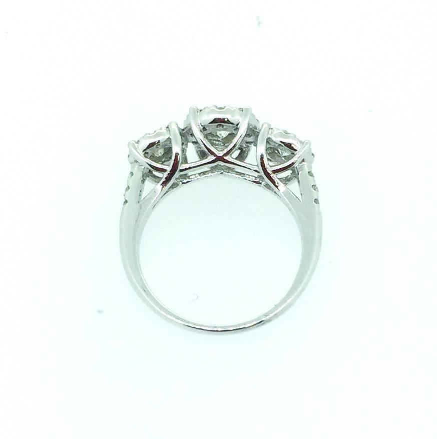 Modern Three-Stone Diamond Round Invisible Ring