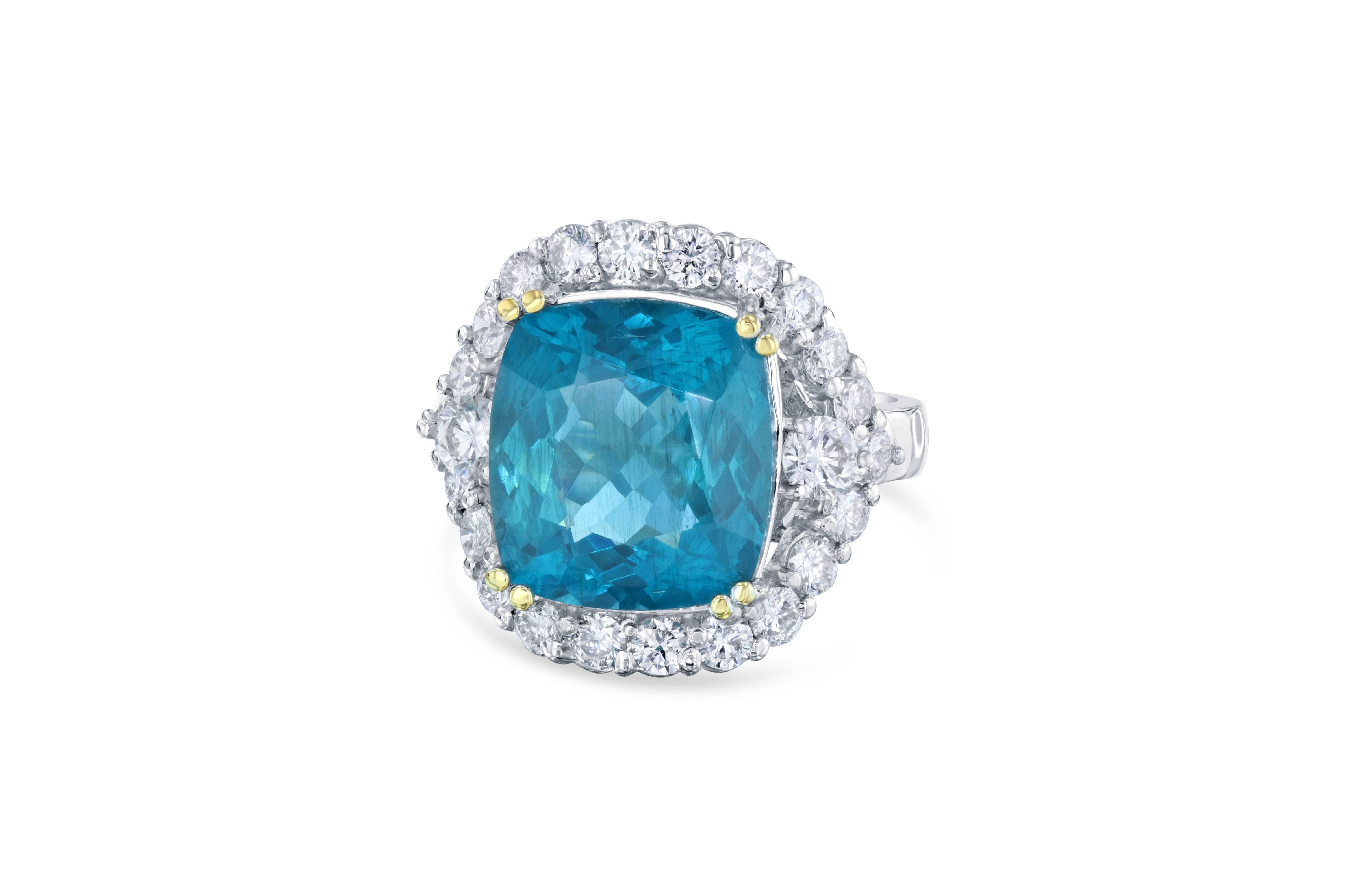 10.08 Carat Cushion Cut Apatite Diamond White Gold Cocktail Ring!

This ring has a large and gorgeous 8.52 carat Apatite in the center of the ring and is surrounded by 24 Round Cut Diamonds that weigh 1.56 carats Clarity: VS2, Color: H.  The total