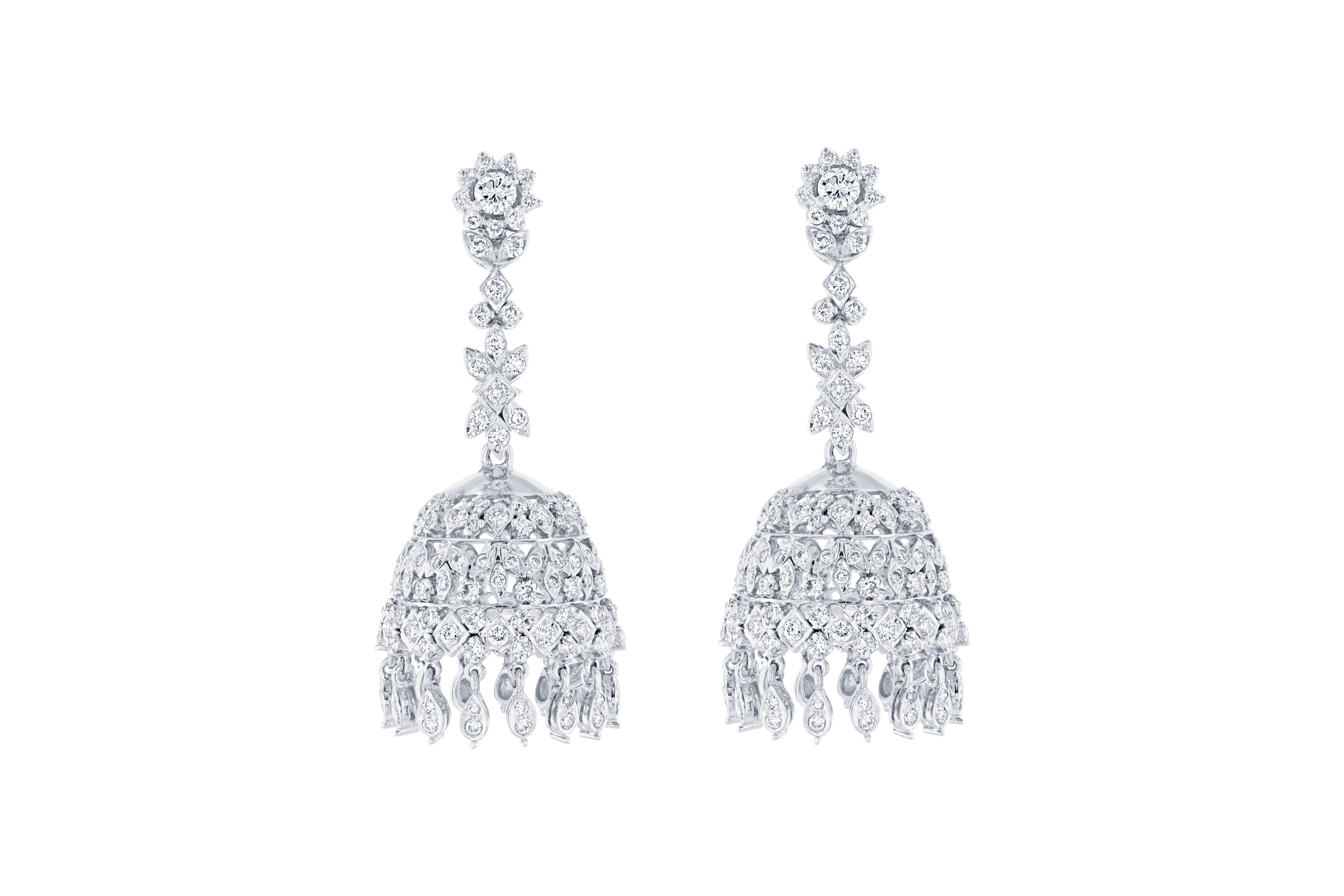 Beautifully hand-crafted one of a kind earrings.  These intricate and rare earrings have 218 Round Cut Diamonds that weigh 4.36 carats. (Clarity: VS2, Color:F)  The length of the earrings is approximately 2.0 inches and the backing of the earrings