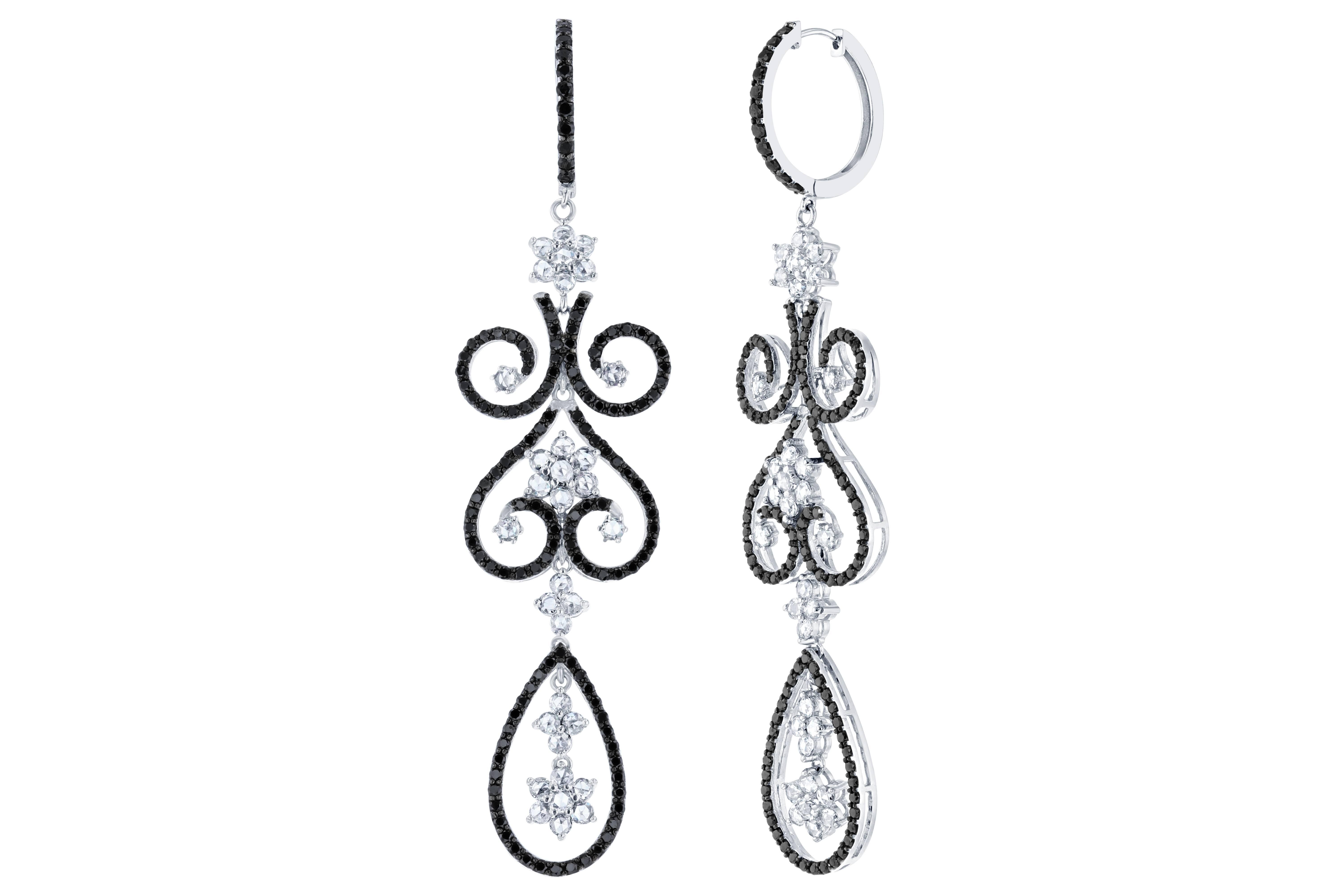 Beautiful Black Diamond and White Rose-Cut Diamond Chandelier Earrings.  This intricate design has 66 Rose Cut Diamonds that weigh 3.98 carats (Clarity: VS2, Color: F) and 270 Black Diamonds that weigh 3.82 carats.  The length of the earrings is