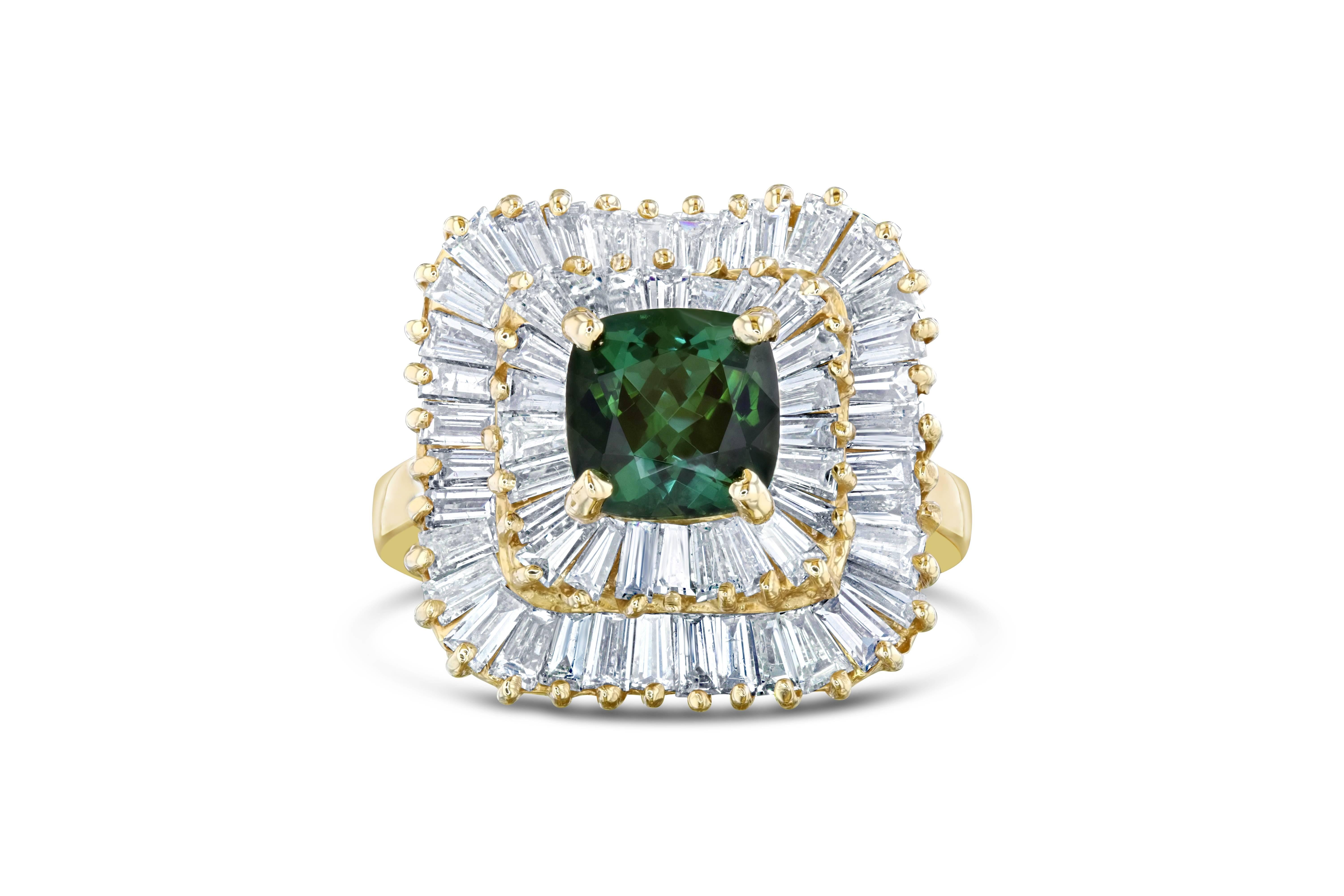 This beautiful ballerina style ring has a Asscher cut Green Tourmaline weighing 1.48 Carats and 60 Baguette Cut Diamonds floating around the tourmaline, weighing 2.18 Carats. The total carat weight of the ring is 3.66 Carats. It is set in 14K Yellow