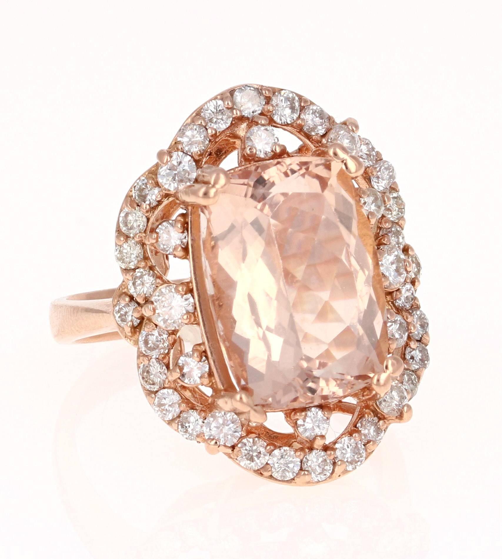 A gorgeous Art-deco inspired ring! This ring has a 6.07 carat Rectangular Cut Morganite in the center of the ring and is surrounded by 40 Round Brilliant Cut Diamonds that weigh 1.06 carats. The ring is casted in 14K Rose gold and weighs