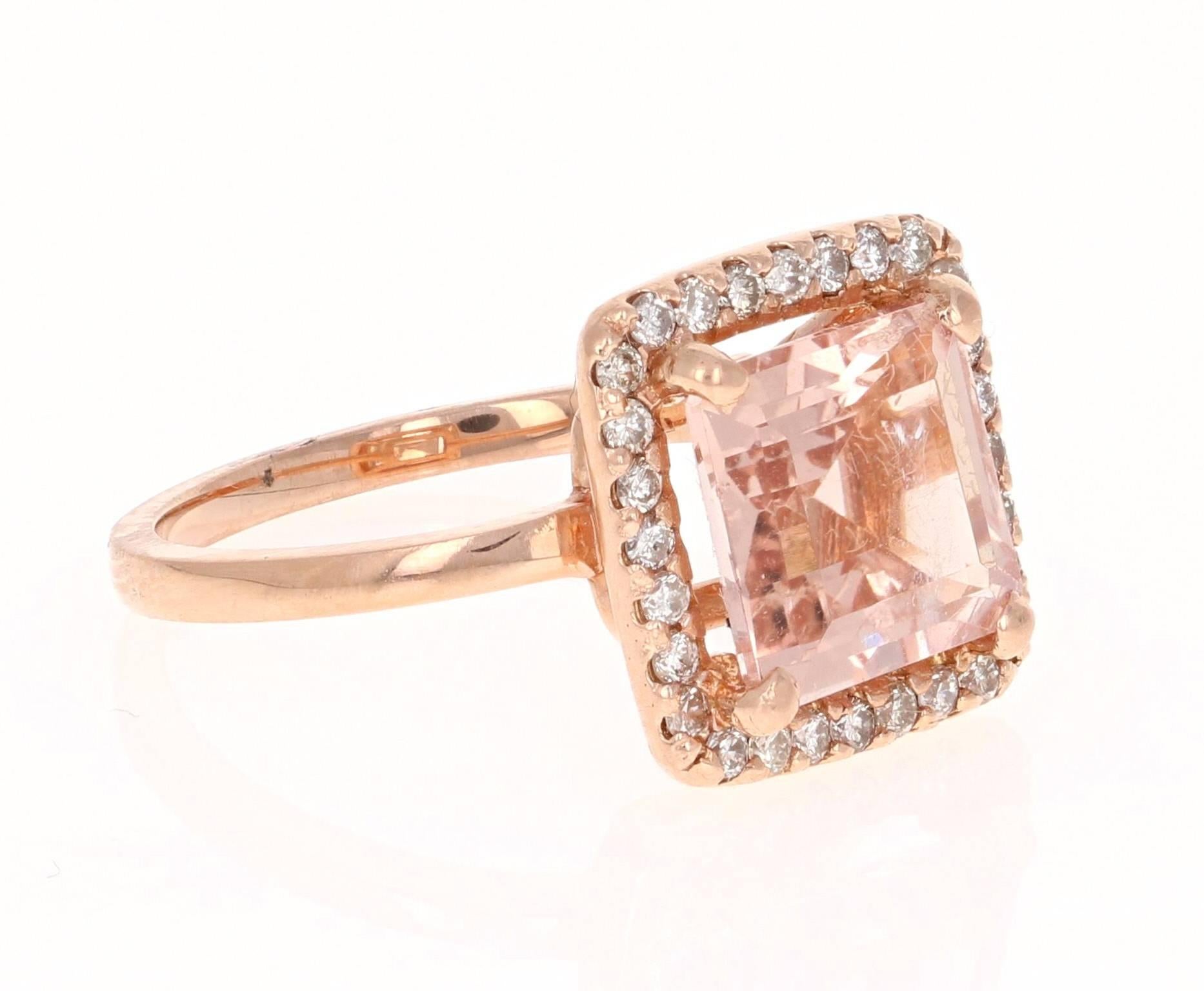 A gorgeous modern setting! This ring has a 3.58 carat Square Cut Morganite in the center of the ring and is surrounded by 28 Round Cut Diamonds that weigh 0.38 carats. The ring is casted in 14K Rose gold and weighs approximately 4.5 grams.. It is a