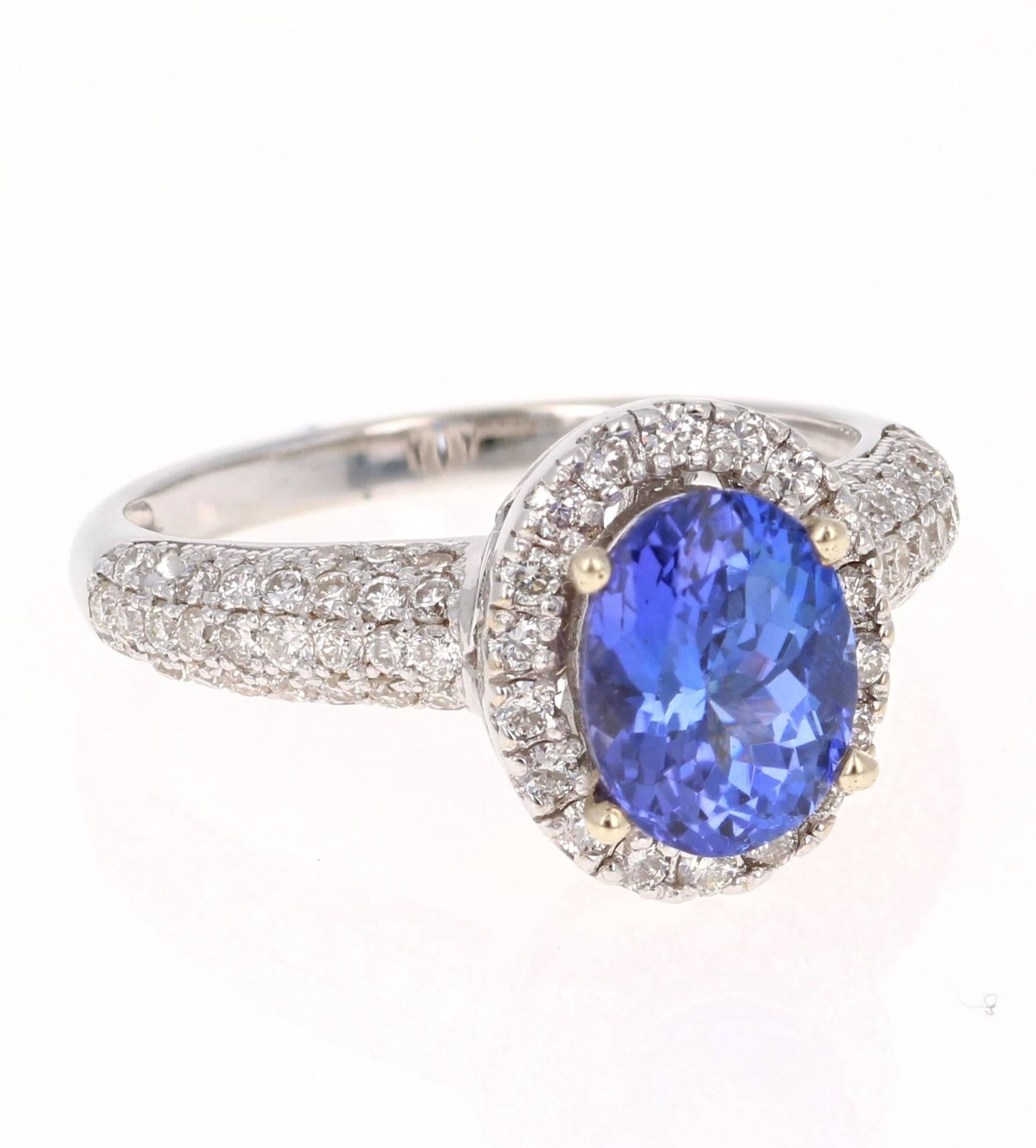 This gorgeous Tanzanite Diamond Ring has a 1.90 Carat Oval Cut Tanzanite as its center stone and is surrounded by 106 Round Cut Diamonds that weigh 0.89 Carats. The Total Carat weight of the ring is 2.79 Carats.   The measurements of the Tanzanite