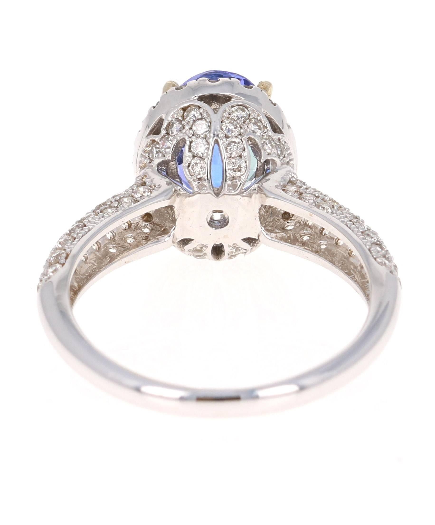 Contemporary 2.79 Carat Tanzanite Halo Diamond 14 Karat White Gold Ring For Sale