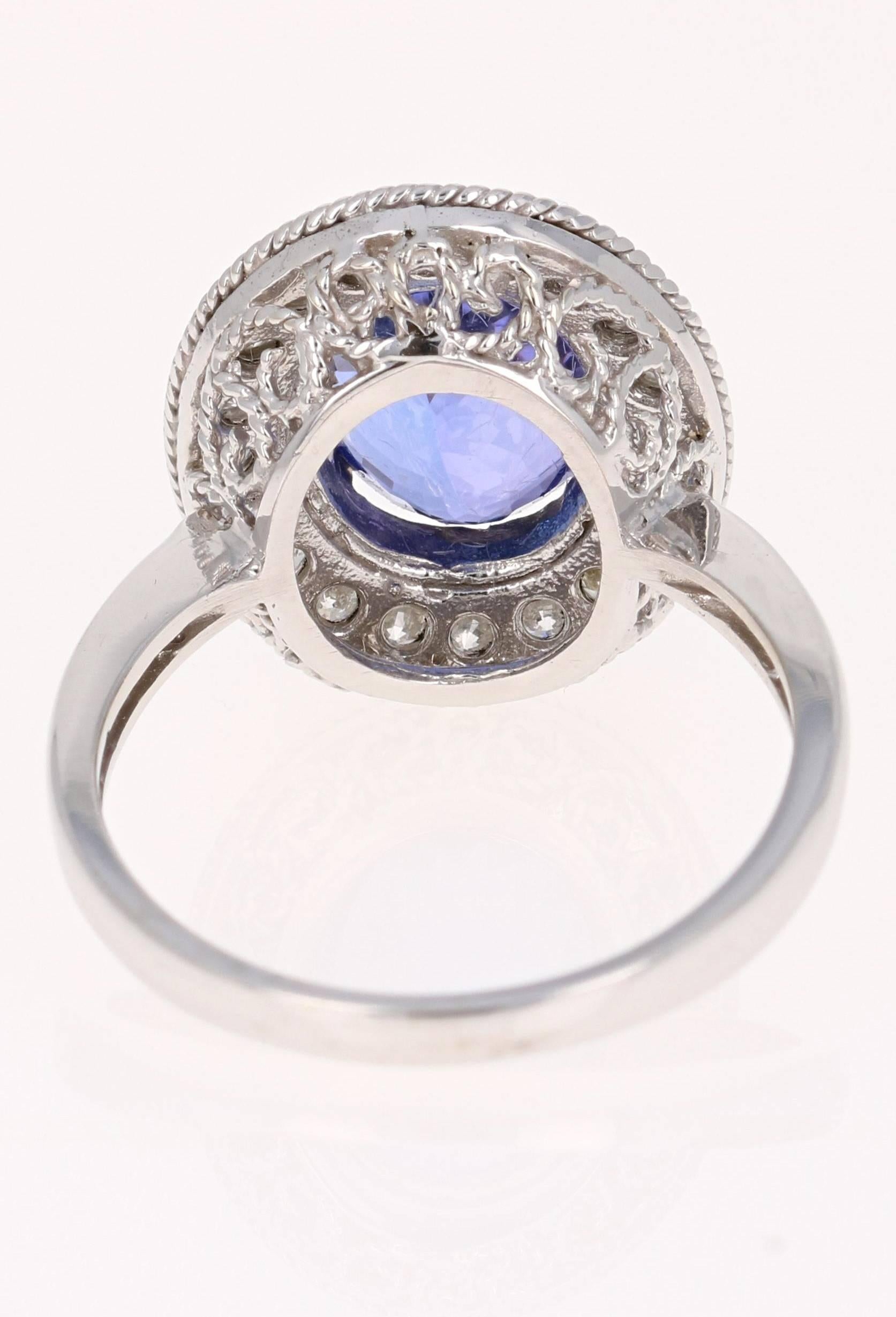 Contemporary 4.27 Carat Oval Cut Tanzanite Diamond White Gold Ring For Sale