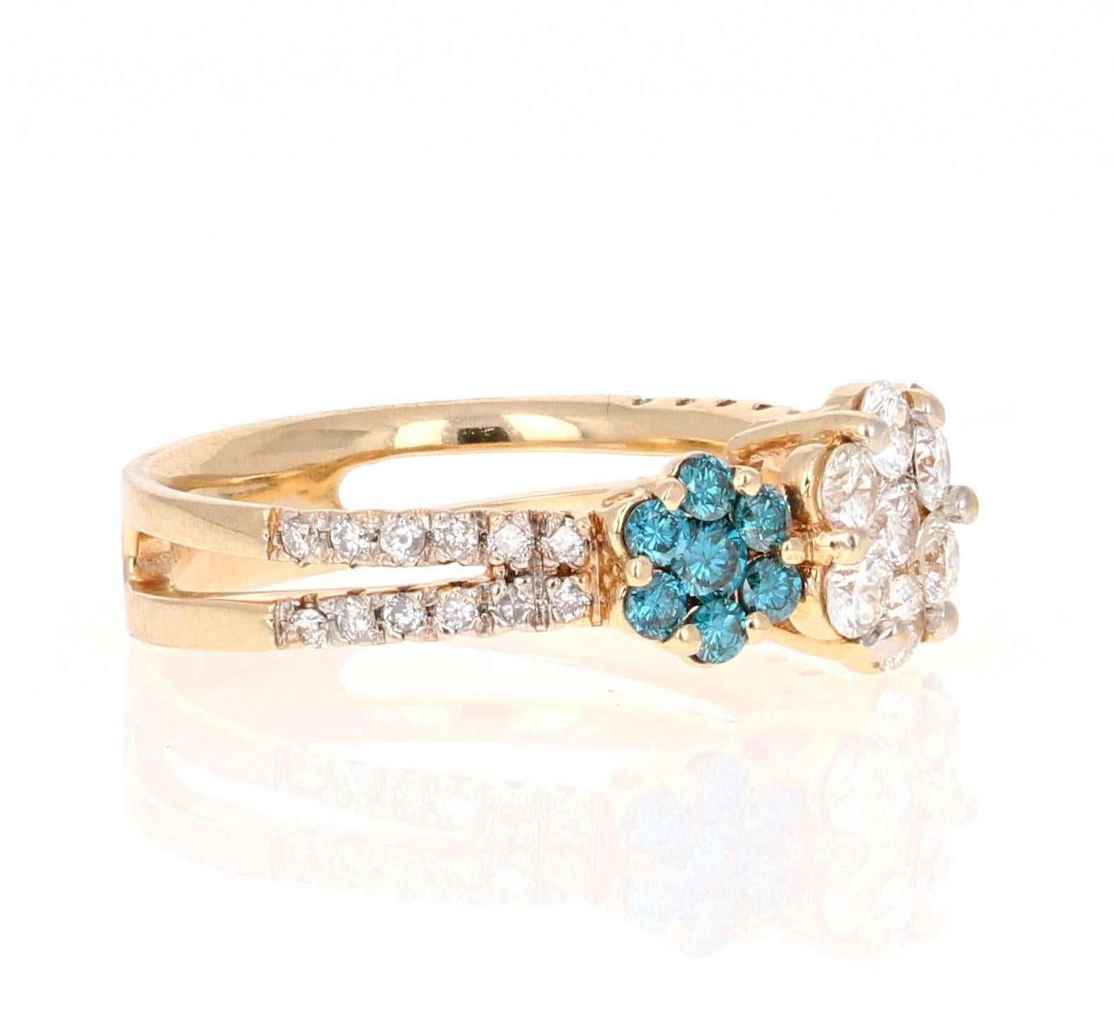 A cute and dainty flower design ring!  This pretty blue diamond cocktail ring can be a great addition to your jewelry collection.  The ring has 14 Blue Round Cut Diamonds that weigh 0.46 carats and 31 White Round Cut Diamonds that weigh 0.85 carats 