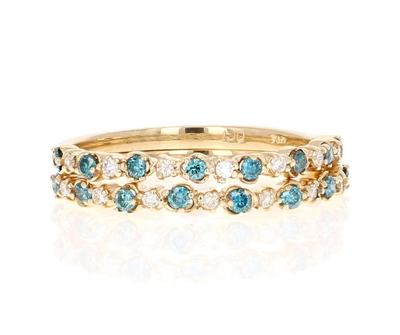 Cute and dainty stackable bands!  These pretty blue and white diamond bands come in a set of 2 - keep 1 for yourself and gift the other or keep them both and stack them up on a finger.  
These bands have 16 Blue Round Cut Diamonds that weigh 0.31