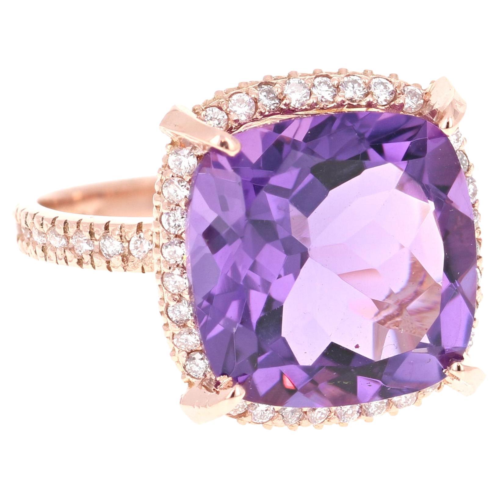This beautiful ring has a 8.18 Carat Cushion Cut Amethyst and is surrounded by 50 Round Cut Diamonds that weigh 0.44 carats (Clarity: SI, Color: F). The total weight of the ring is 8.62 carats. 

The ring is designed in 14K Rose Gold and weighs
