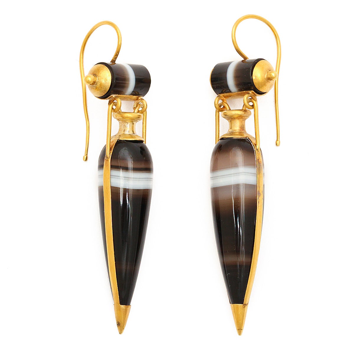 Victorian Classical Revival sardonyx (banded agate) amphora-form pendant earrings, set in a gold frame. 

English, ca. 1890
Length: 2 3/8 inches