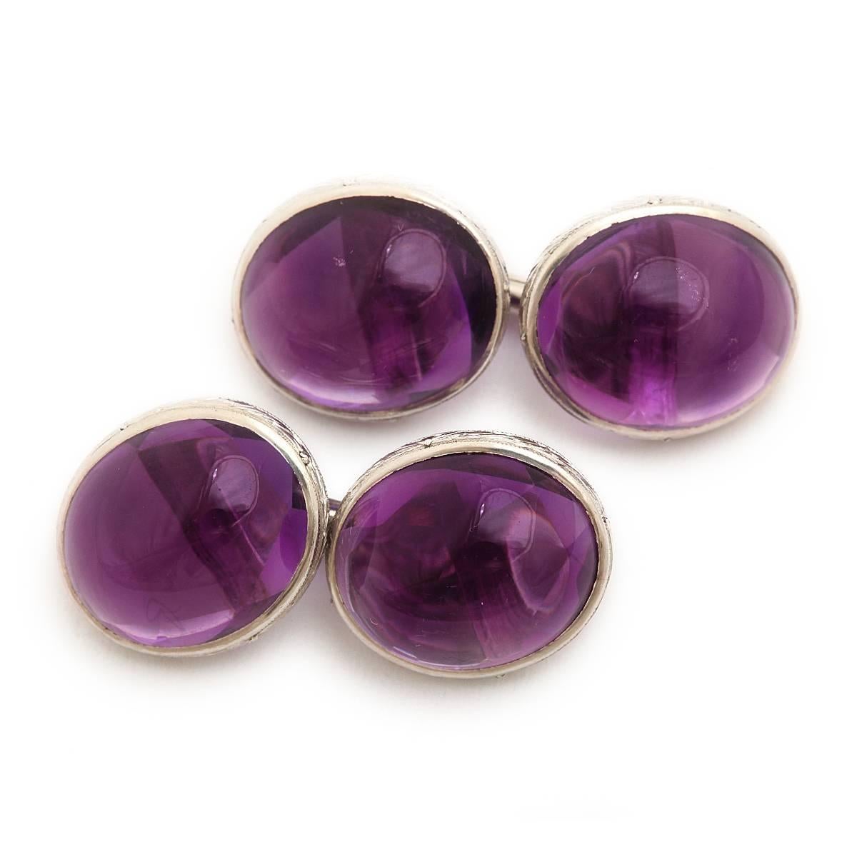 Antique cabochon amethyst double cufflinks, set in platinum. 

By Tiffany & Co, NY, ca. 1910  