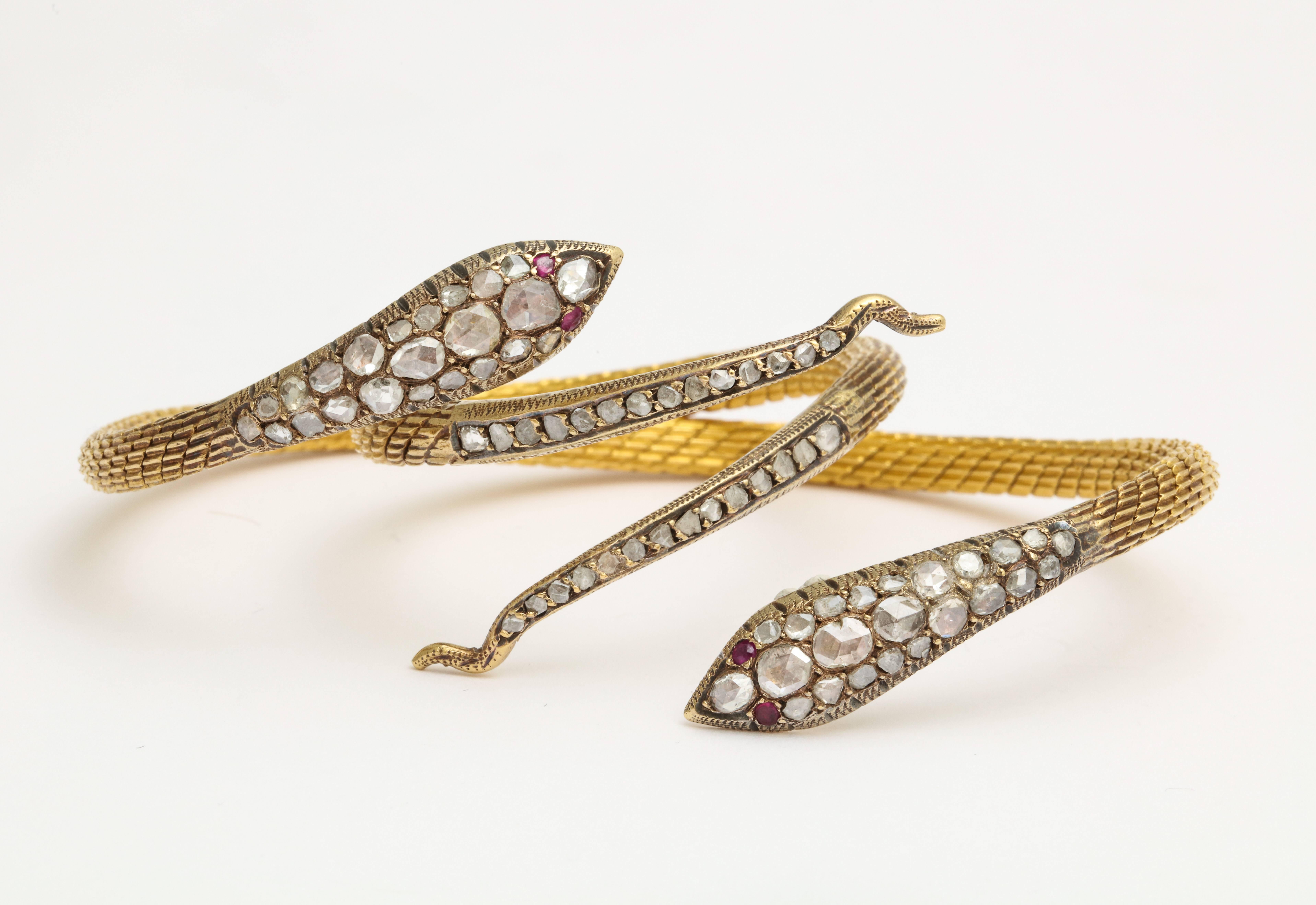 Circa 1960's Rose Cut Diamond Ruby Snake Bangle Bracelets In Excellent Condition In New York, NY