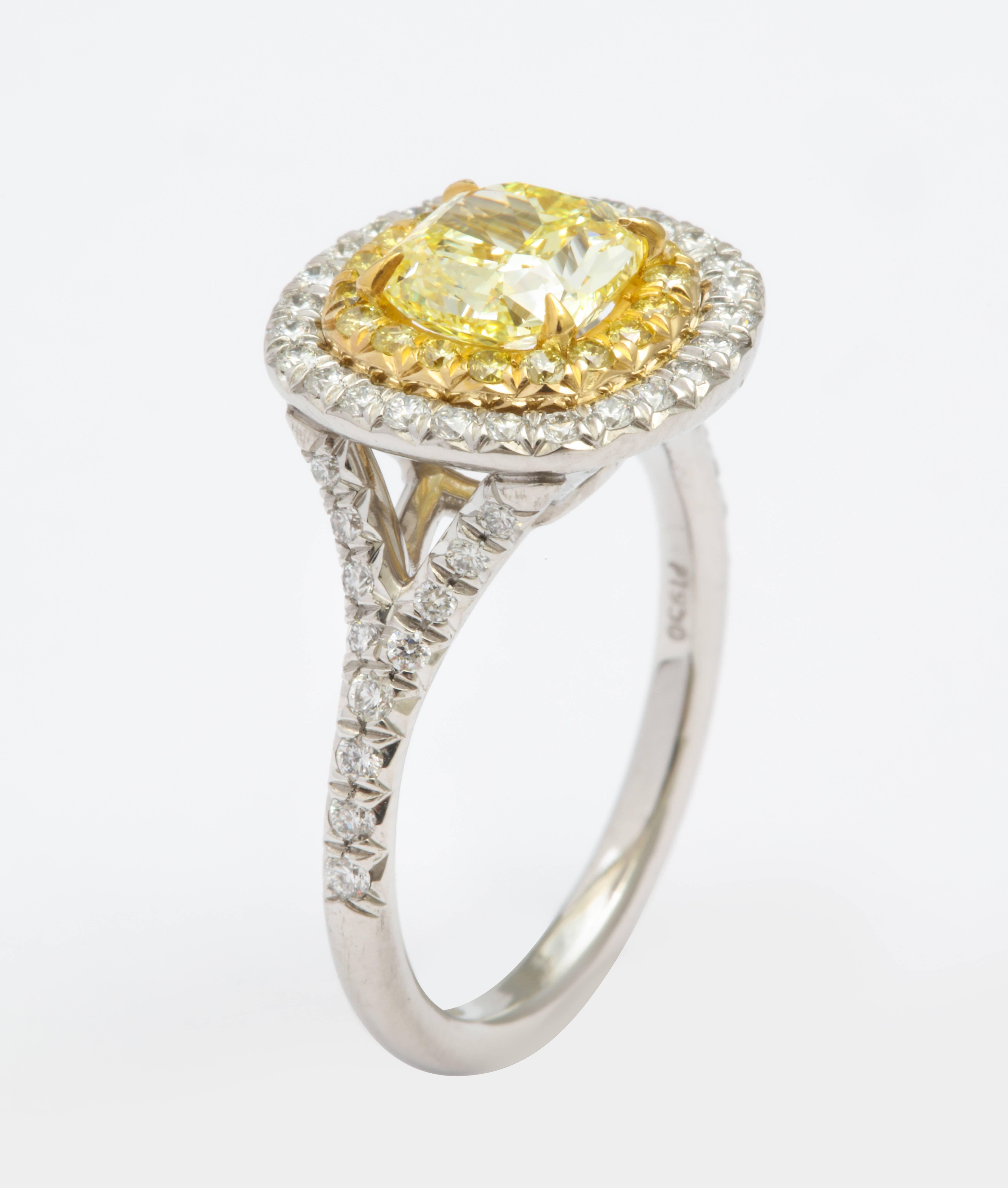 GIA Certified Cushion Cut Intense Yellow Diamond Ring in Platinum  In New Condition In New York, NY