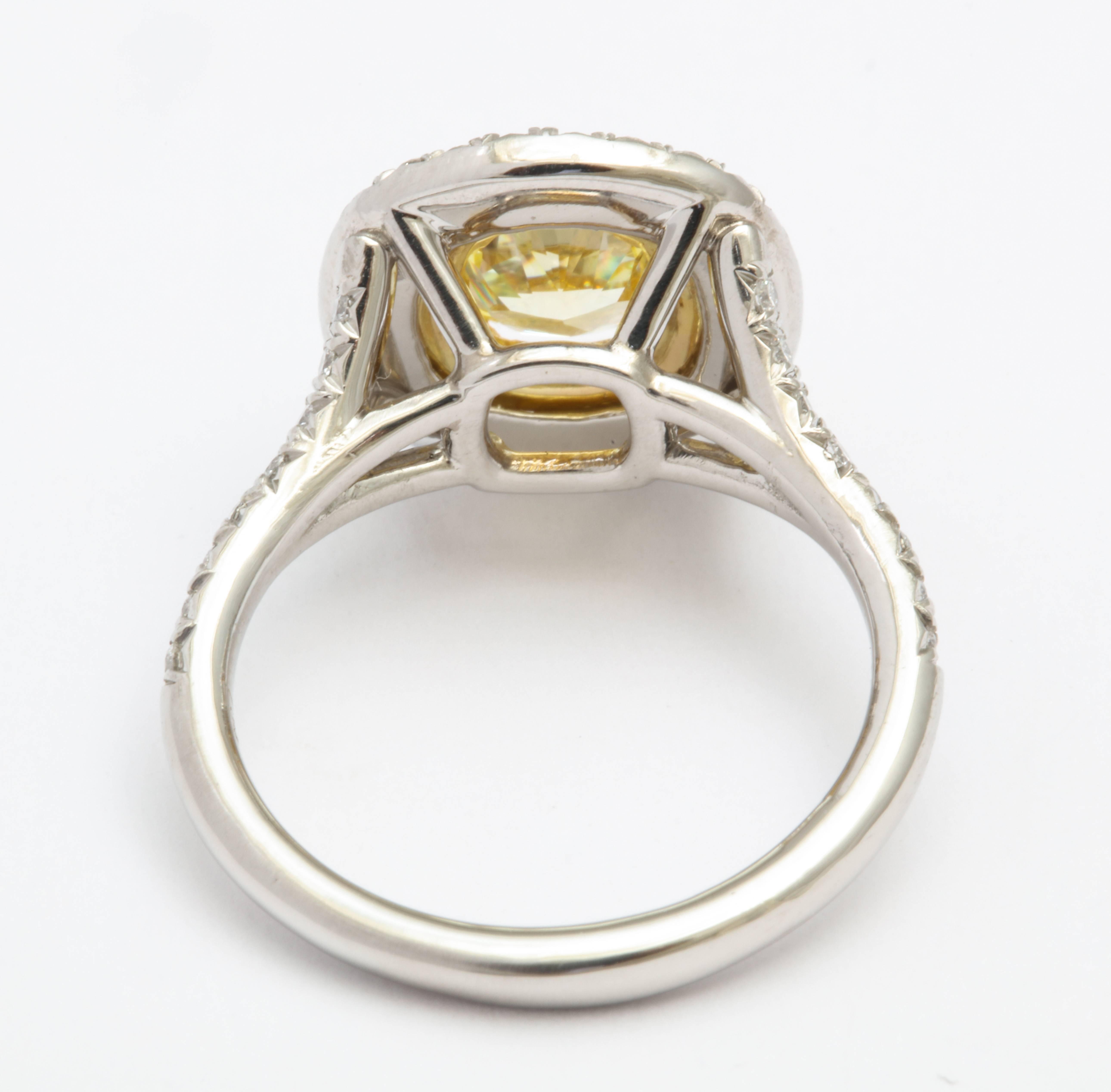 Women's or Men's GIA Certified Cushion Cut Intense Yellow Diamond Ring in Platinum 