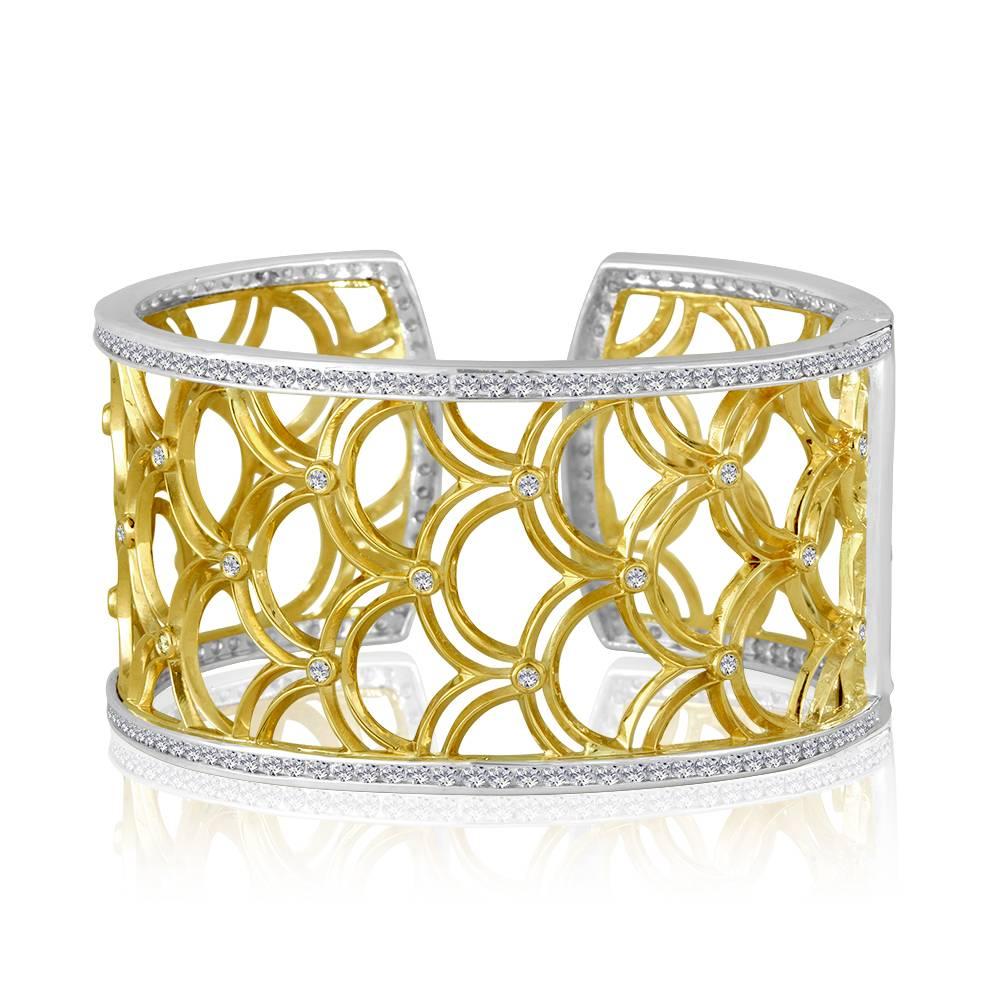 Exclusively from Design By Vatche, Honey Collection
Beautifully hand crafted 14 karat green gold and sterling silver with diamonds. This cuff bracelet opens with a spring claps for a secure and easy wear.
Diamonds: 6.71 carat total weight. 
Diamond