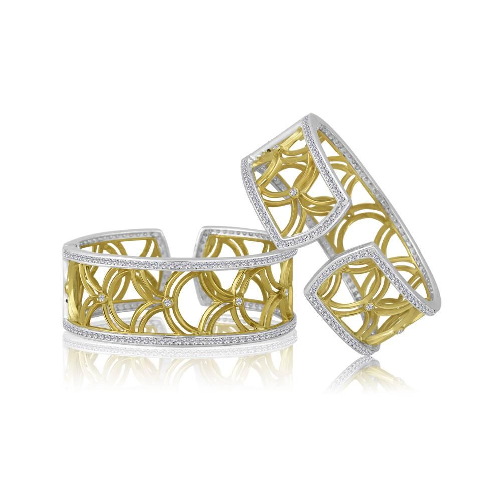 Exclusively from Design By Vatche, Honey Collection
Beautifully hand crafted 14 karat gold and sterling silver with diamonds. This cuff bracelet opens with a spring claps for a secure and easy wear.
Diamonds: 5.99 carat total weight. 
Diamond color