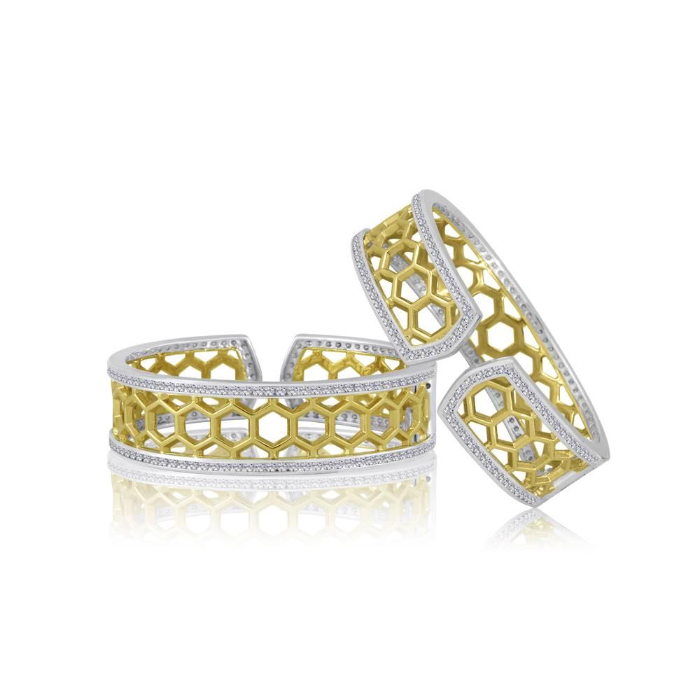 Exclusively from Design By Vatche, Honey collection 
Beautifully hand crafted 14 karat gold and sterling silver with diamonds all around cuff bracelet. This cuff bracelet opens with a spring claps for a secure and easy wear.
Diamonds: 6.09 carat