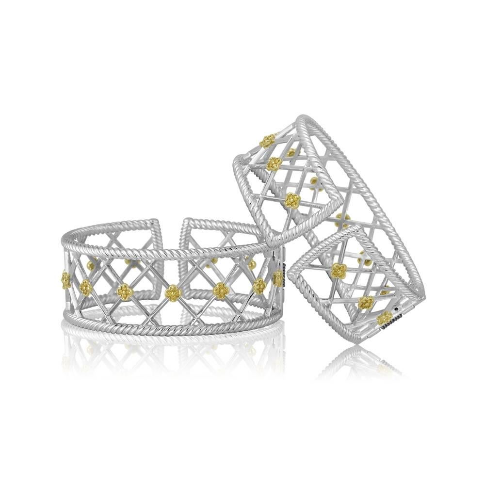 Exclusively from Designs by Vatche, Honey Collection.
Beautifully hand crafted sterling silver with green gold flower design with yellow diamonds. This cuff bracelet opens with a spring clasp for a secure and easy wear.
Diamonds: .52 carat total