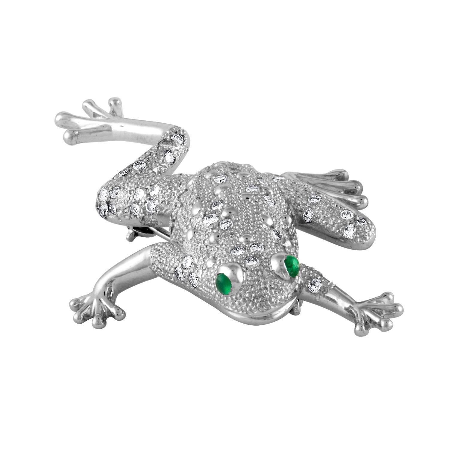 This brooch is designed by Design by Vatche.
Made out of .950 platinum. 
diamonds: 1cttw.
emerald: .35cttw
weight: 10.7 dwt 