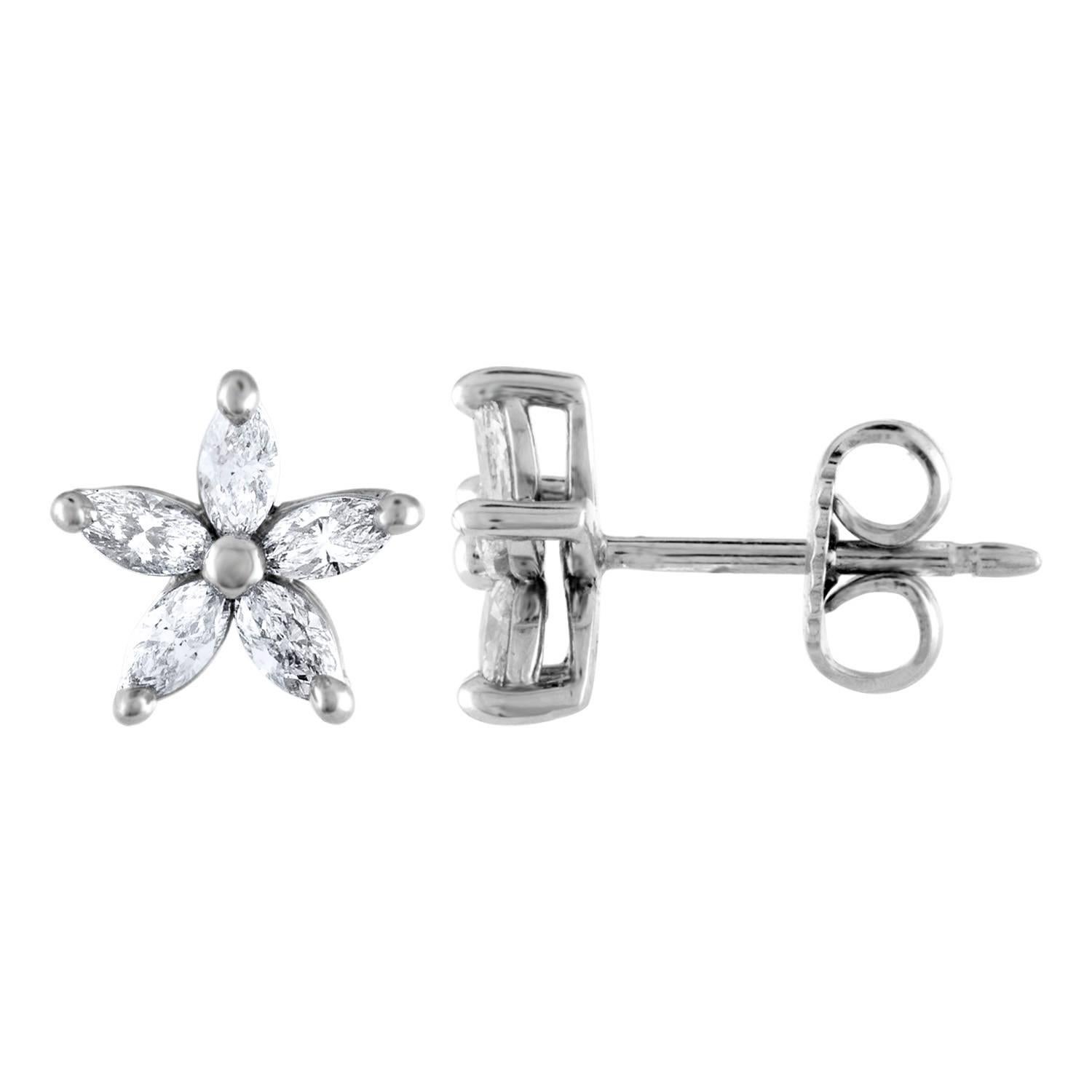 Small .70 Carat Platinum Flower Diamond Stud Earrings For Sale