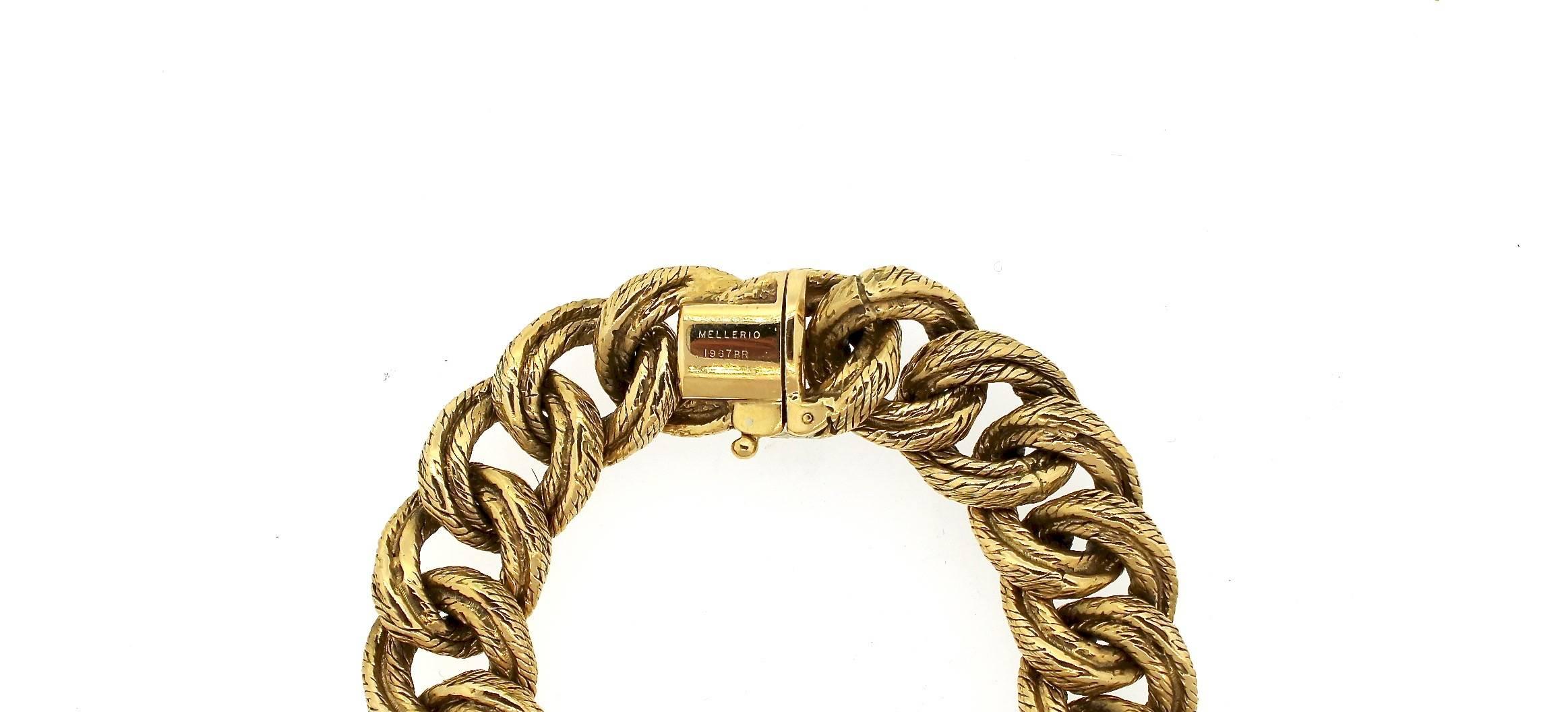 This twisted textured gold curblink bracelet has a nice weight and feel to it.  It is made by George L'Enfant, a gold French craftsman in the 1950s and 1960s who made jewelry for houses such as Van Cleef & Arpels and Mellerio dits Meller.  This