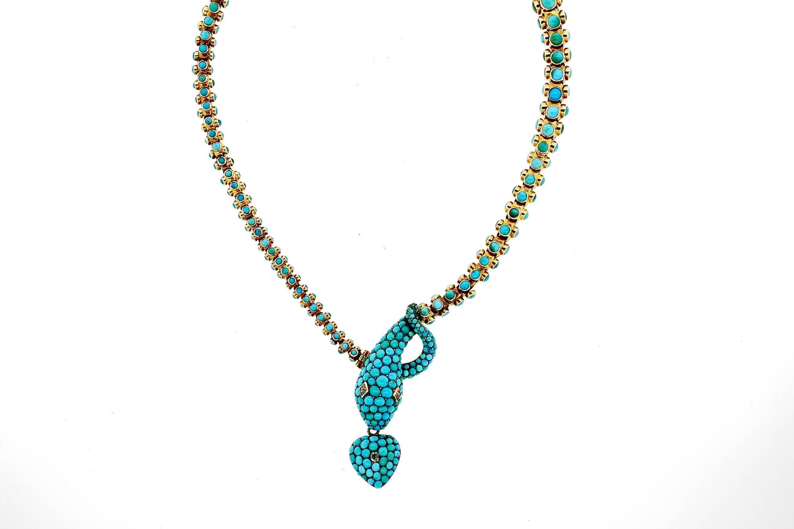 Antique turquoise gold snake necklace with a heart pendant, circa 1880. Serpents have long been depicted in jewelry for centuries.  During the reign of Queen Victoria in England, snake jewelry became particularly popular after Albert proposed to her