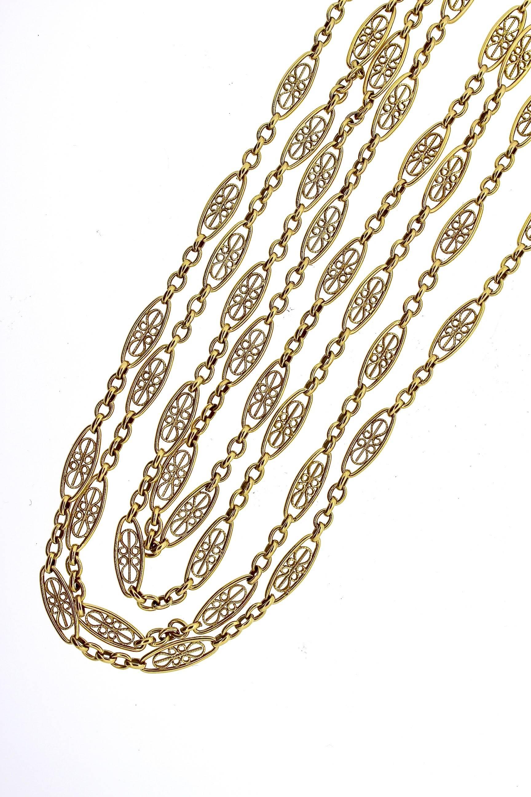 Gold chains are so stylish and easy to wear in todays fashion.  Vintage chains add character and a twist to today's modern choices.  This antique chain was made in the early 20th Century and features beautiful filigree scroll links.  The chain was