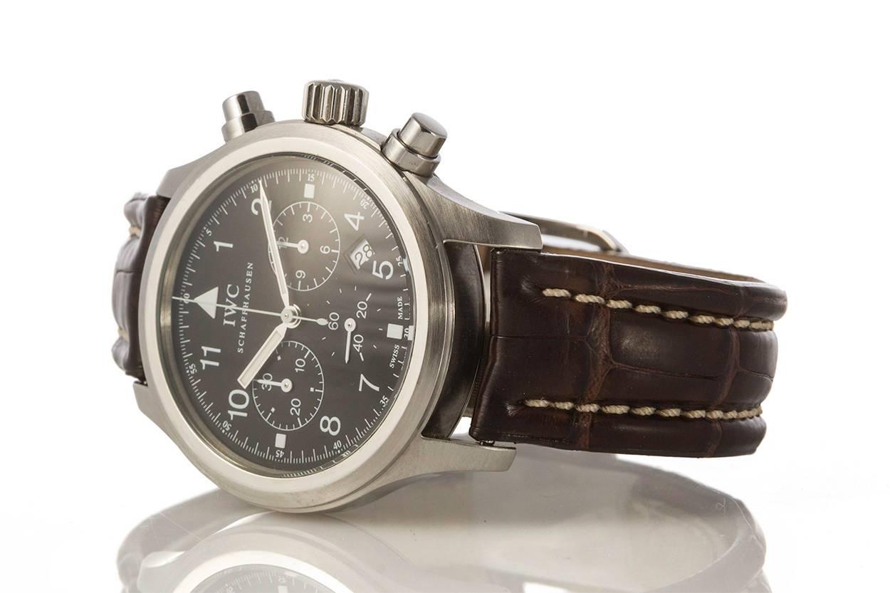 We are pleased to offer this IWC Stainless Steel Def Flieger Chronograph Quartz Pilot Watch 3741. It features a quartz movement with chronograph function. It also features an aftermarket dark brown alligator strap with original IWC buckle. It will