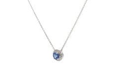Tiffany & Co. Collana con ciondolo Soleste in platino con zaffiro e diamanti a halo